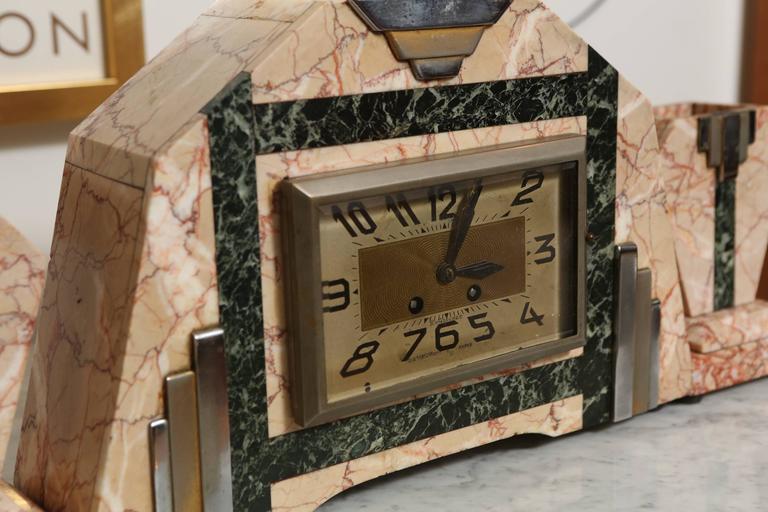 Parisian Art Deco Mantel Clock and Bookends at 1stdibs