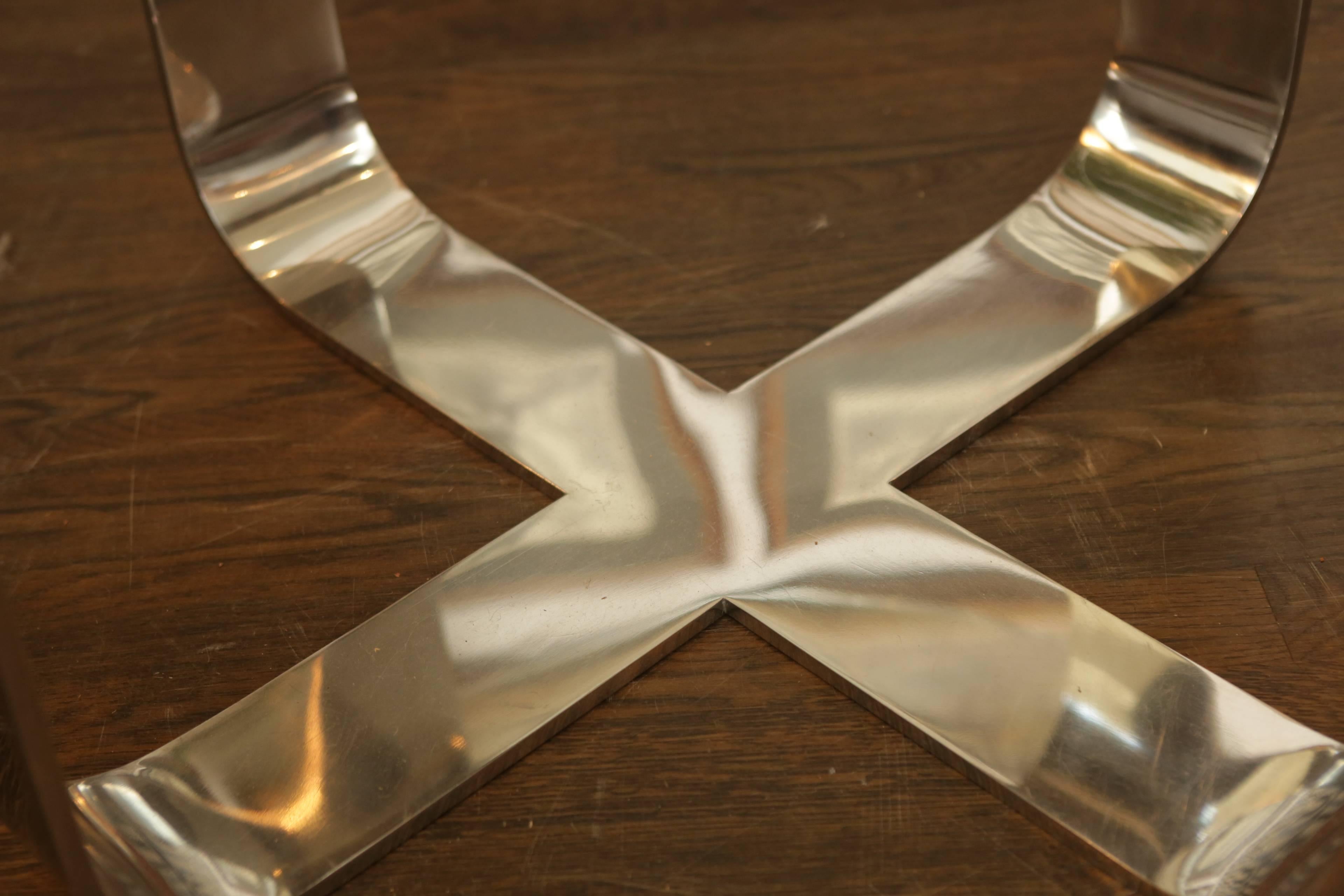 A heavy X-shaped square coffee table base. Made of stainless steel and chrome coated, circa 1970