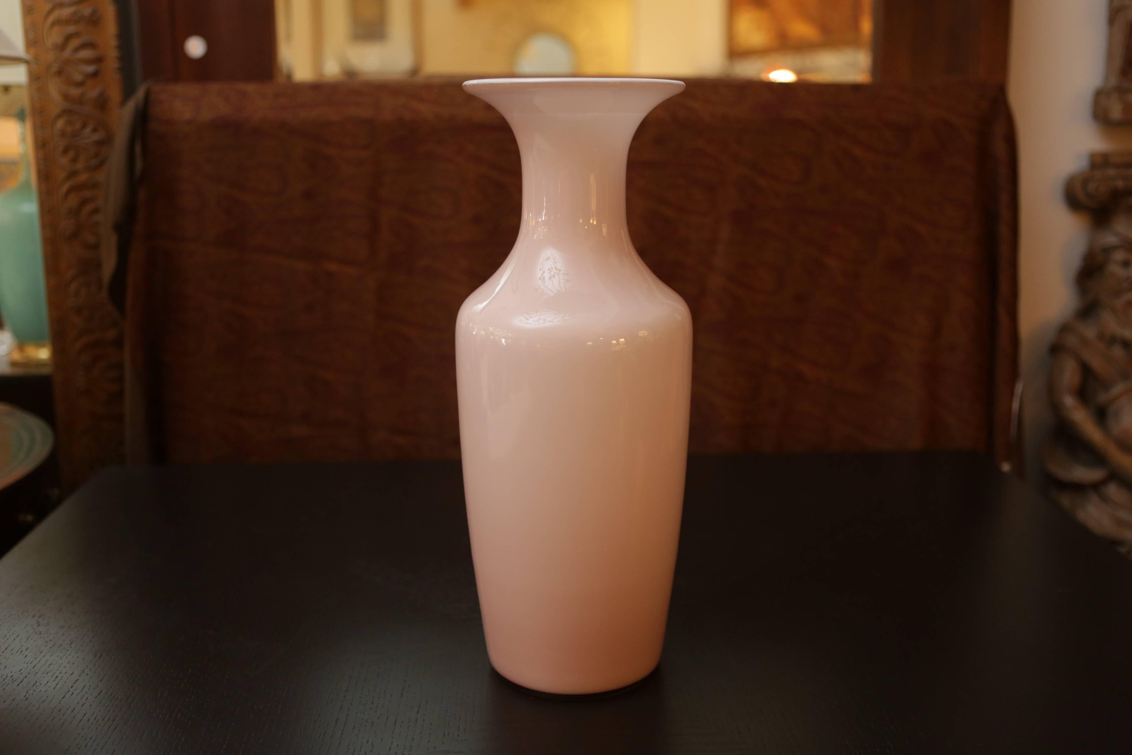 A lovely blush colored signed Venini Italia Murano glass vase.