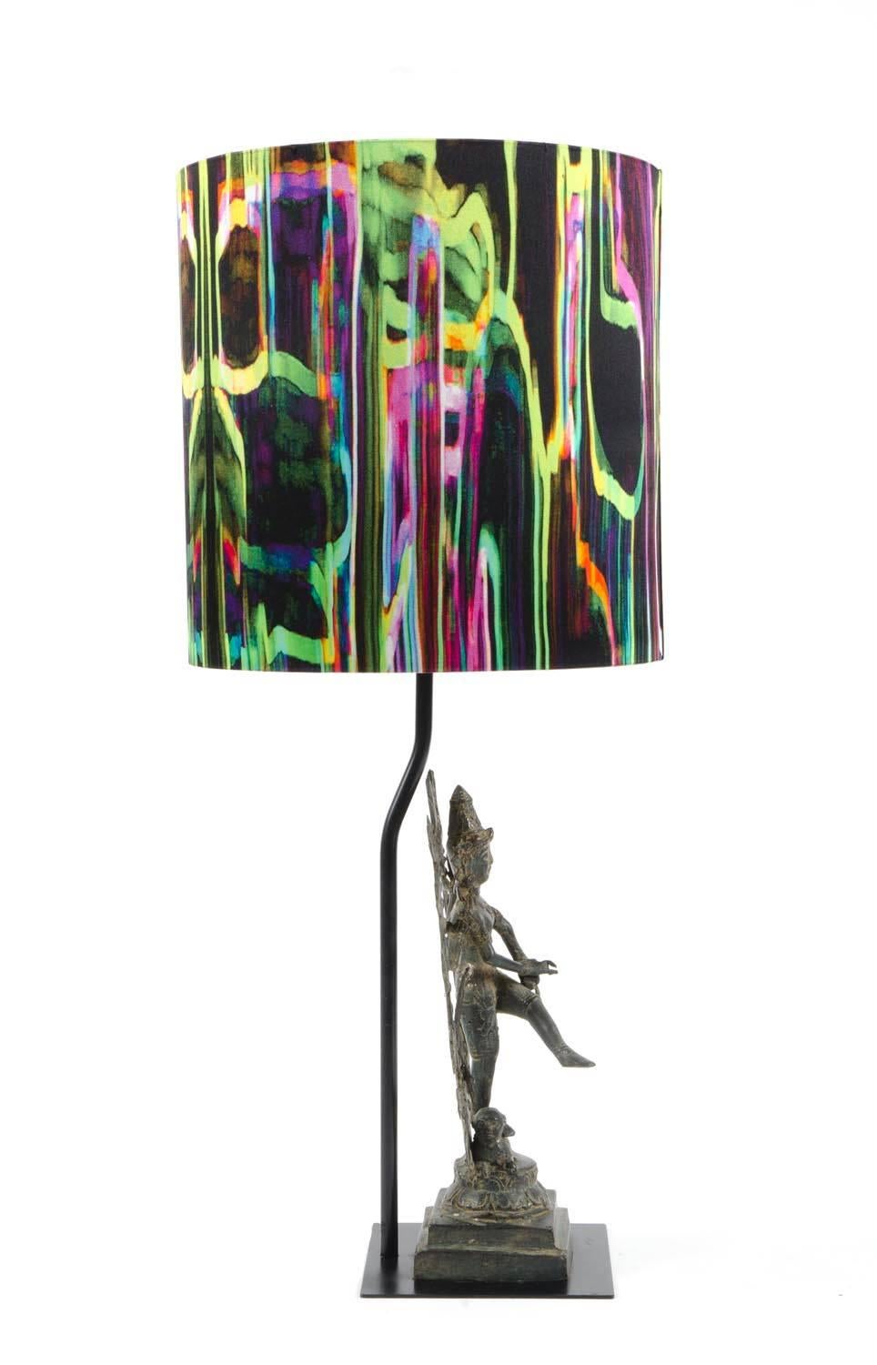 Lamp base in bronze. 40cm (H), 25cm (W), 15cm (D) with silk shade in jungle fever silk fabric by Mariska Meijers. Shade made in Holland trimmed with gold inside. 25cm (H), 25cm (D). Total height lampshade plus base: 62cm.

Please note that only