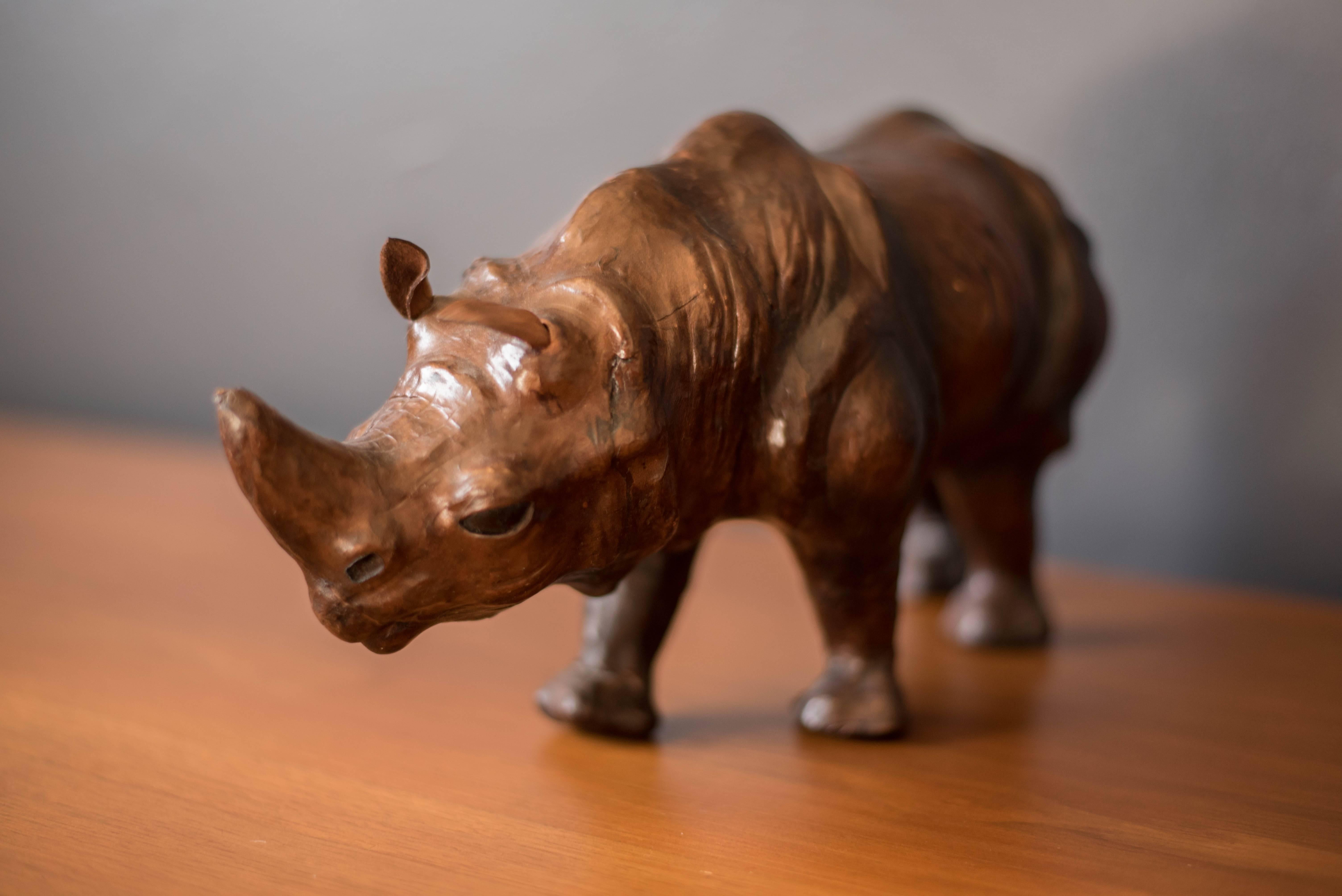 Vintage Mid-Century leather rhinoceros, circa 1960s. This sculpture is made of wood and carved aged leather. 

