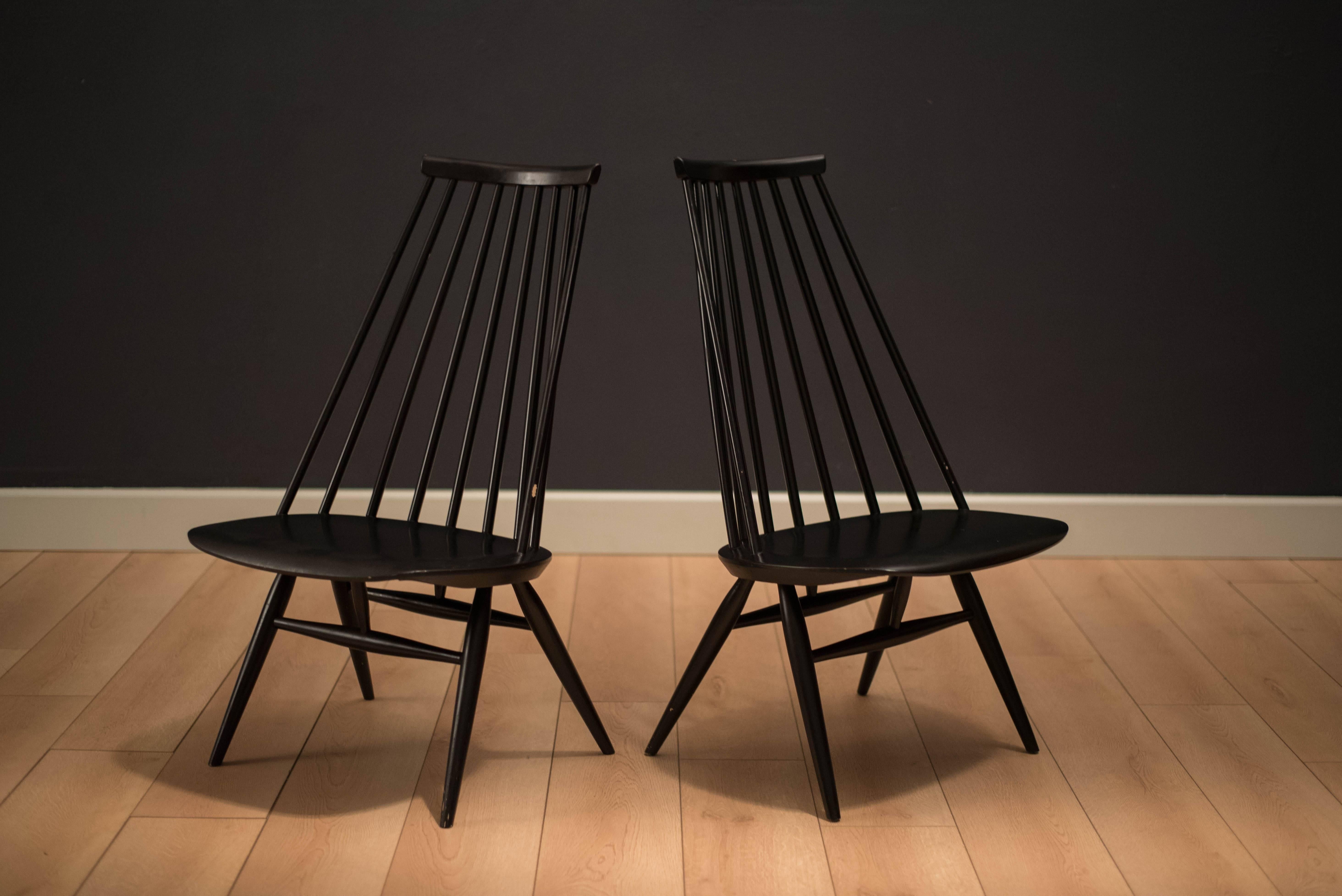 Mid-Century Mademoiselle chairs designed by Ilmari Tapiovaara for Edsby-verken, Sweden. This pair features unique bentwood seats with a curved backrest. Chairs have original black lacquer finish.

                                