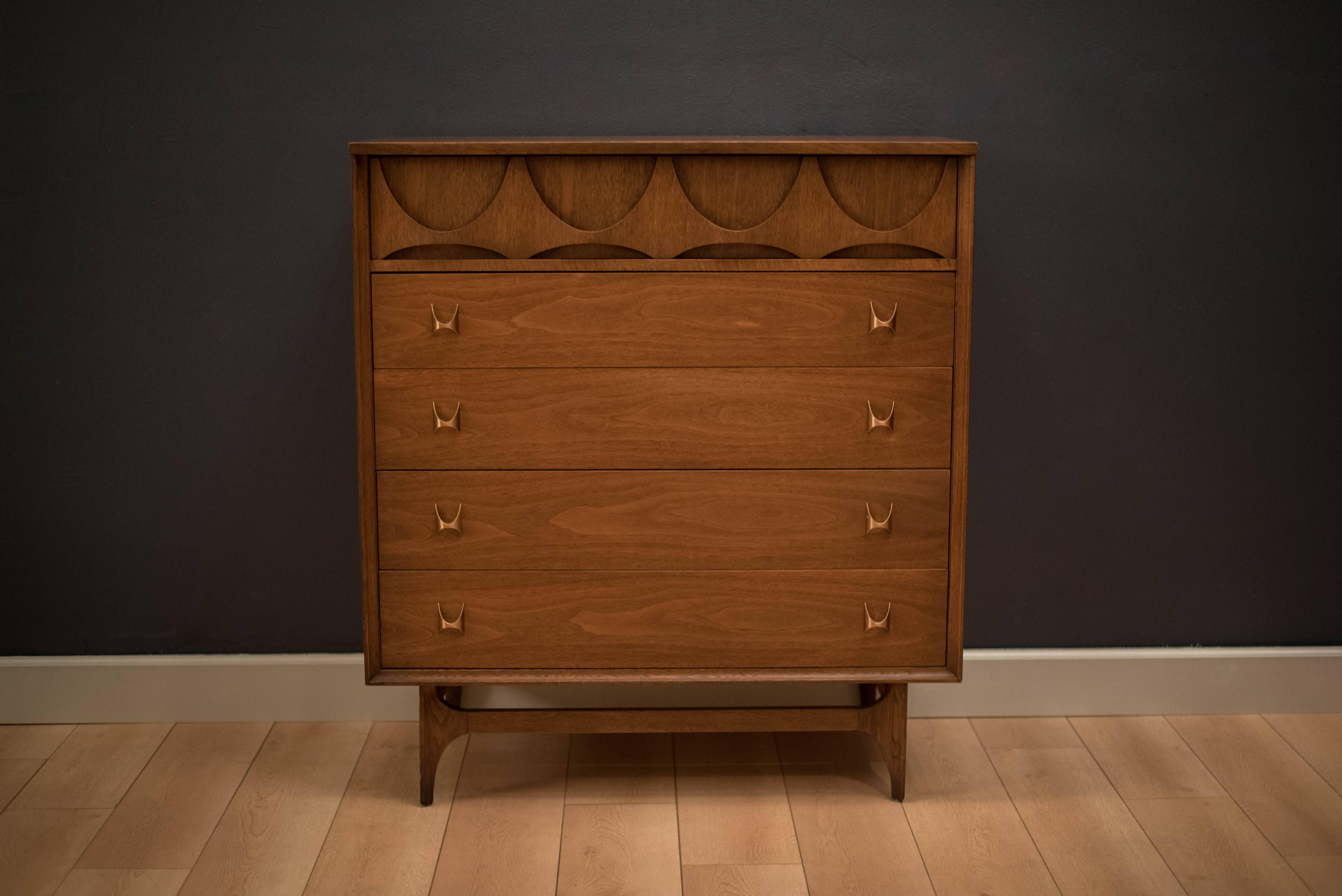 Mid-Century Brasilia highboy dresser manufactured by Broyhill Premier, circa 1960s. This piece includes five spacious drawers and is accessorized with the line's signature brass handles.

