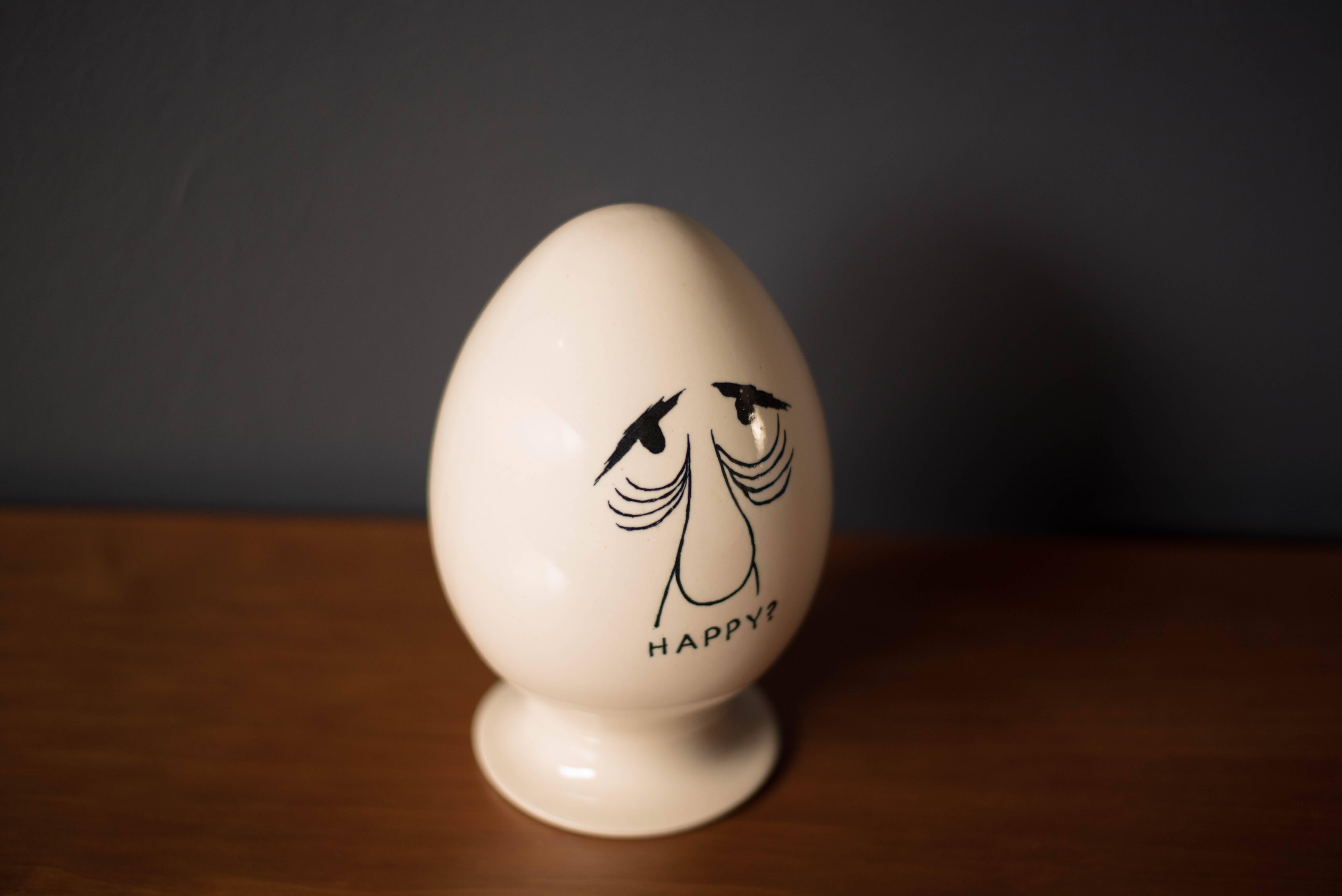 Mid-Century ceramic egghead condom holder designed by Lagardo Tackett. This collectible piece was a mail order item advertised through Playboy Magazine. Signed Tack on the bottom and made in Japan. Does not include cork bottom. 

