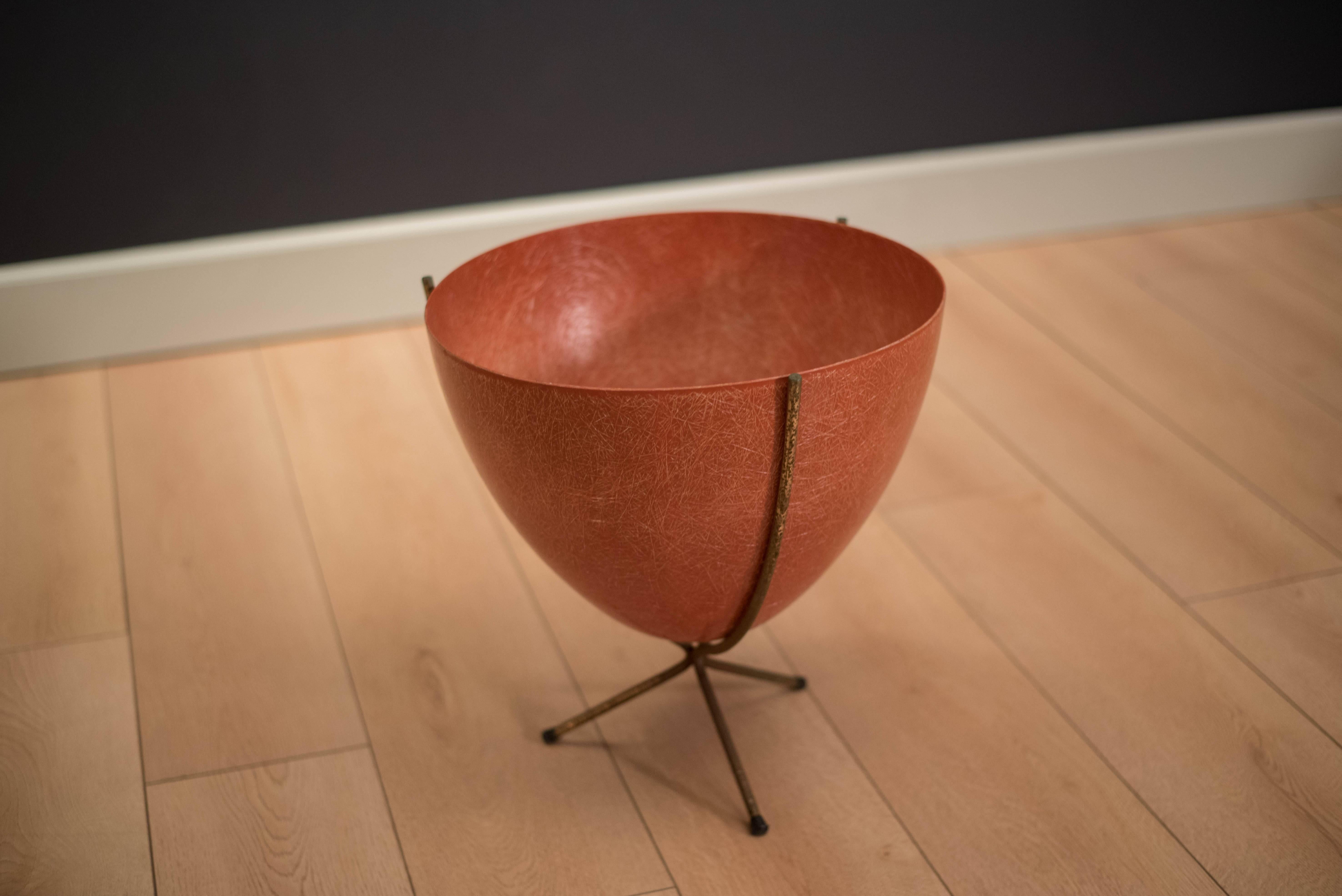 Vintage fiberglass bullet planter by Kimball Manufacturing Co. of San Francisco, circa 1960s. This piece comes in a vibrant orange color and metal base.

 