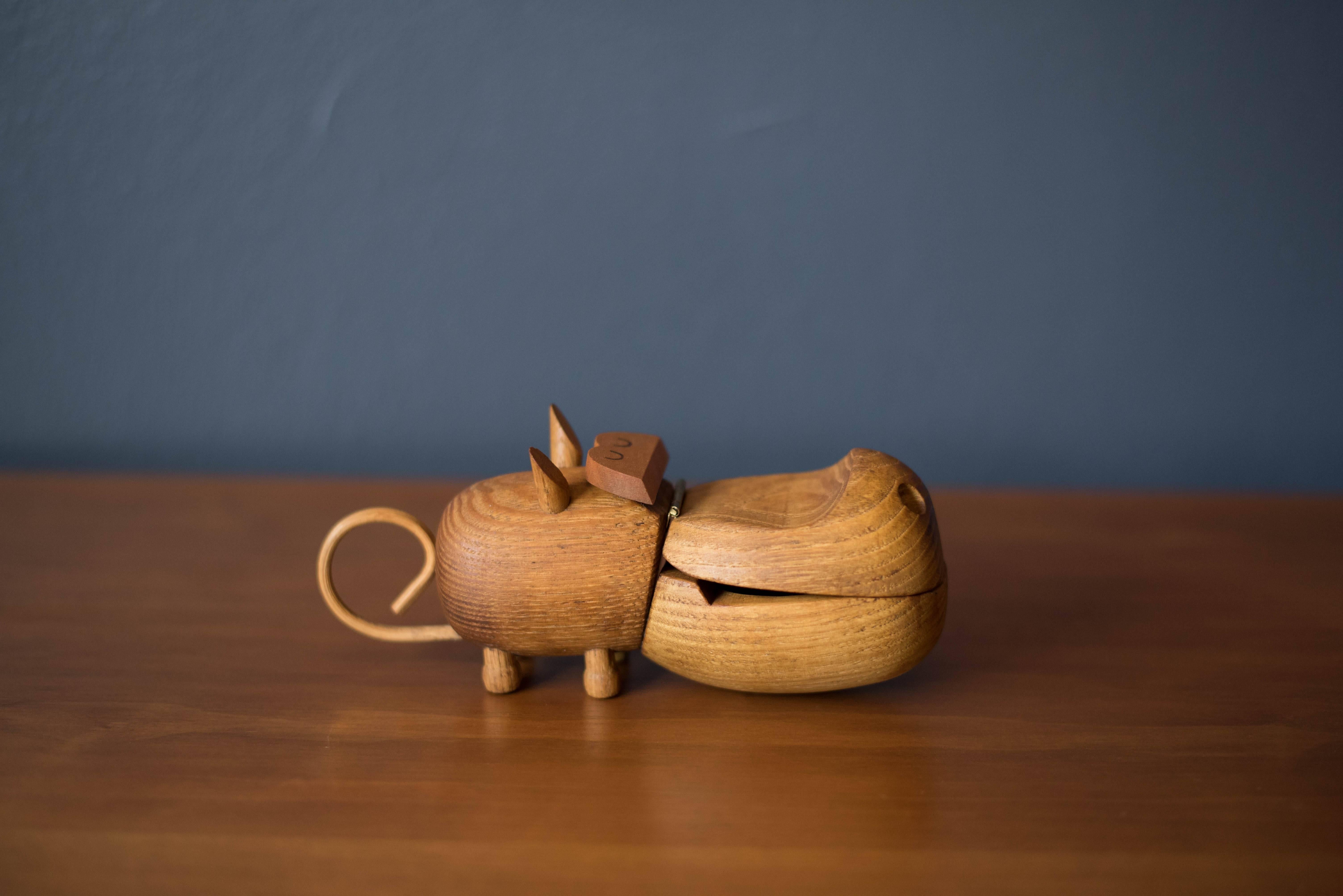 Mid-Century wooden toy hippo manufactured by Zoo Line, Japan, 1959. This hippo is in good original condition and retains all parts with tail intact.
  
  