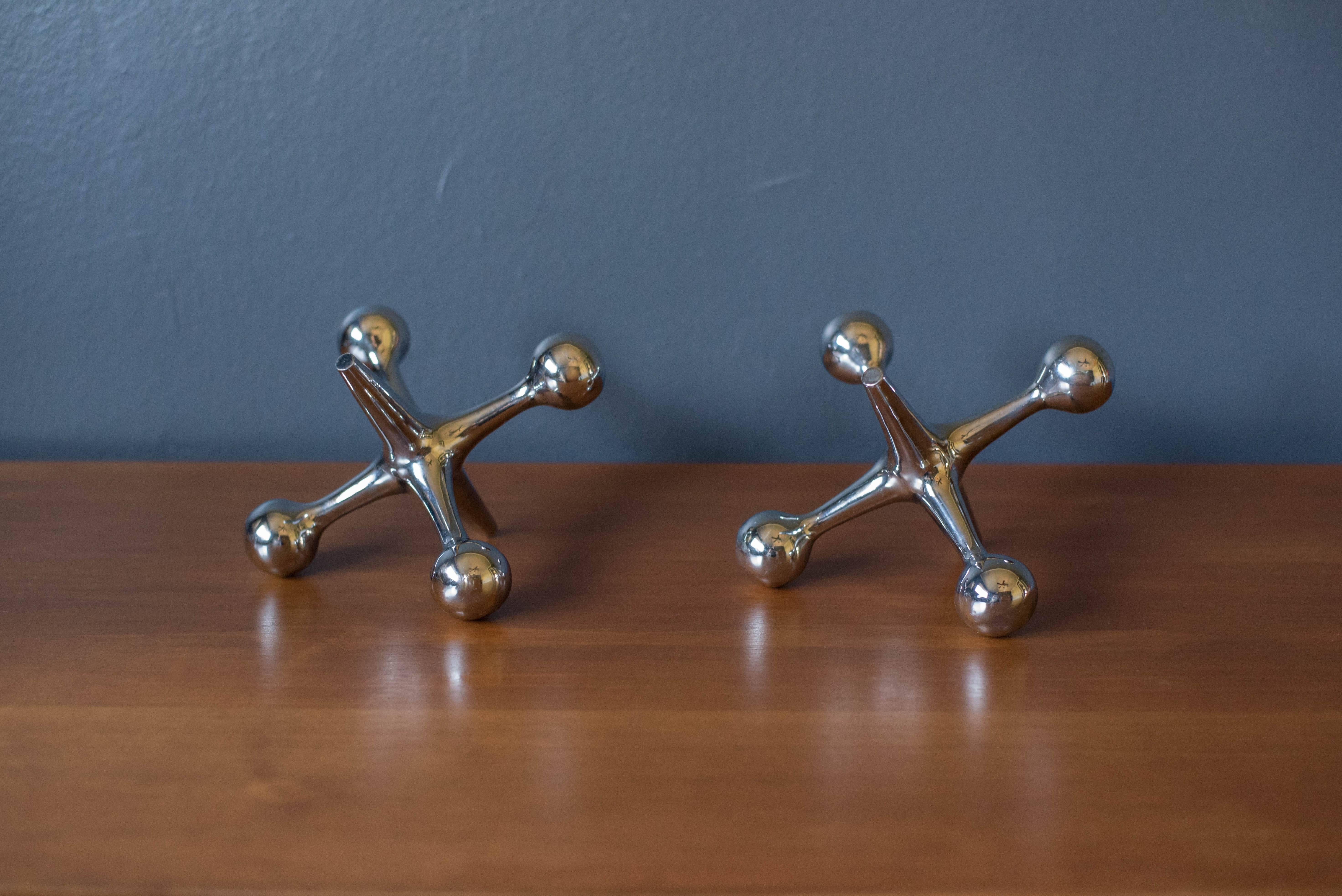 Mid-Century Modern jacks by Bill Curry for Design Line. This pair is made of chrome and can be displayed as bookends. Price is for the set. 

 