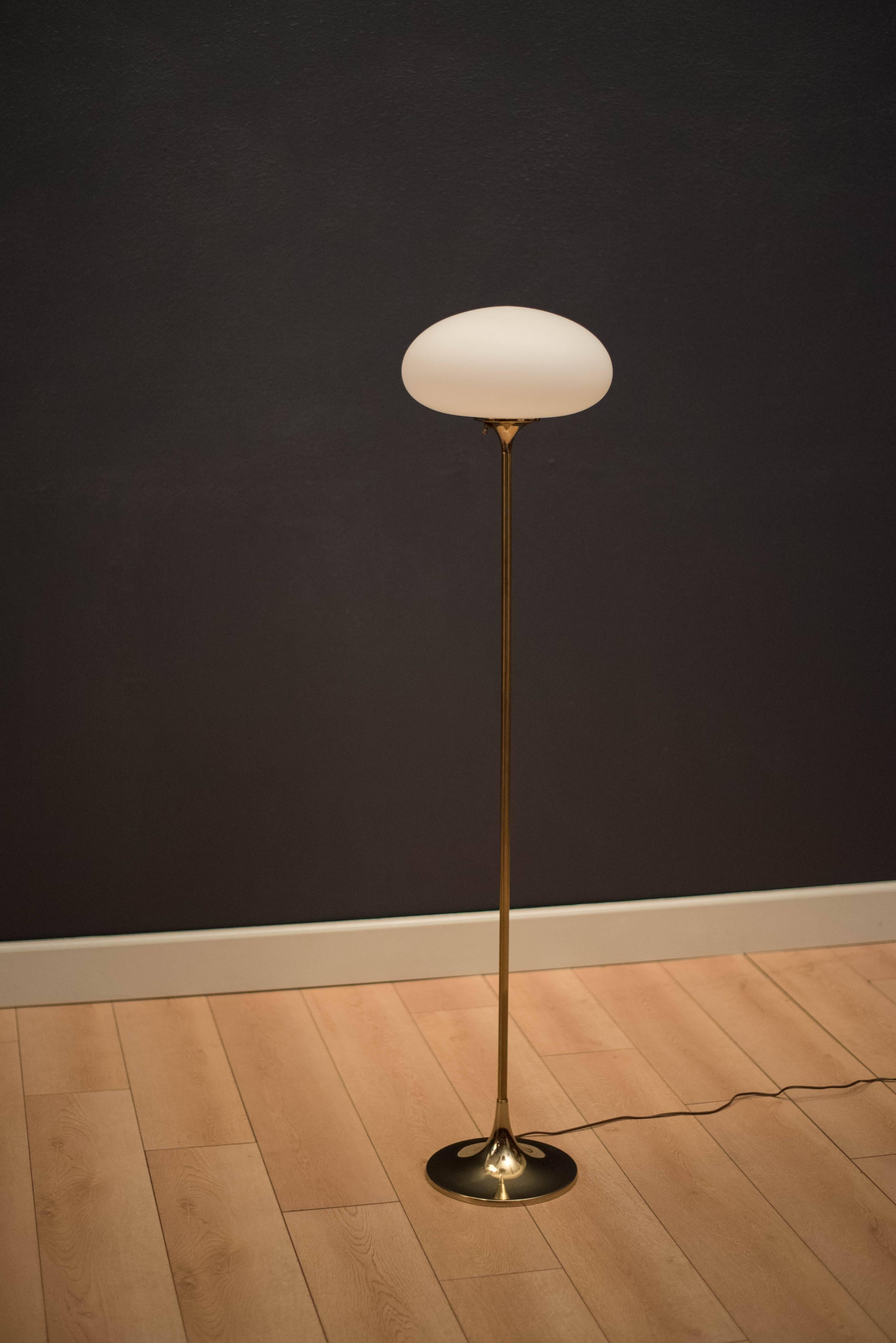 Mid-Century Modern Laurel floor lamp in brass. This piece features a frosted glass mushroom shade and includes a three-way switch.


  