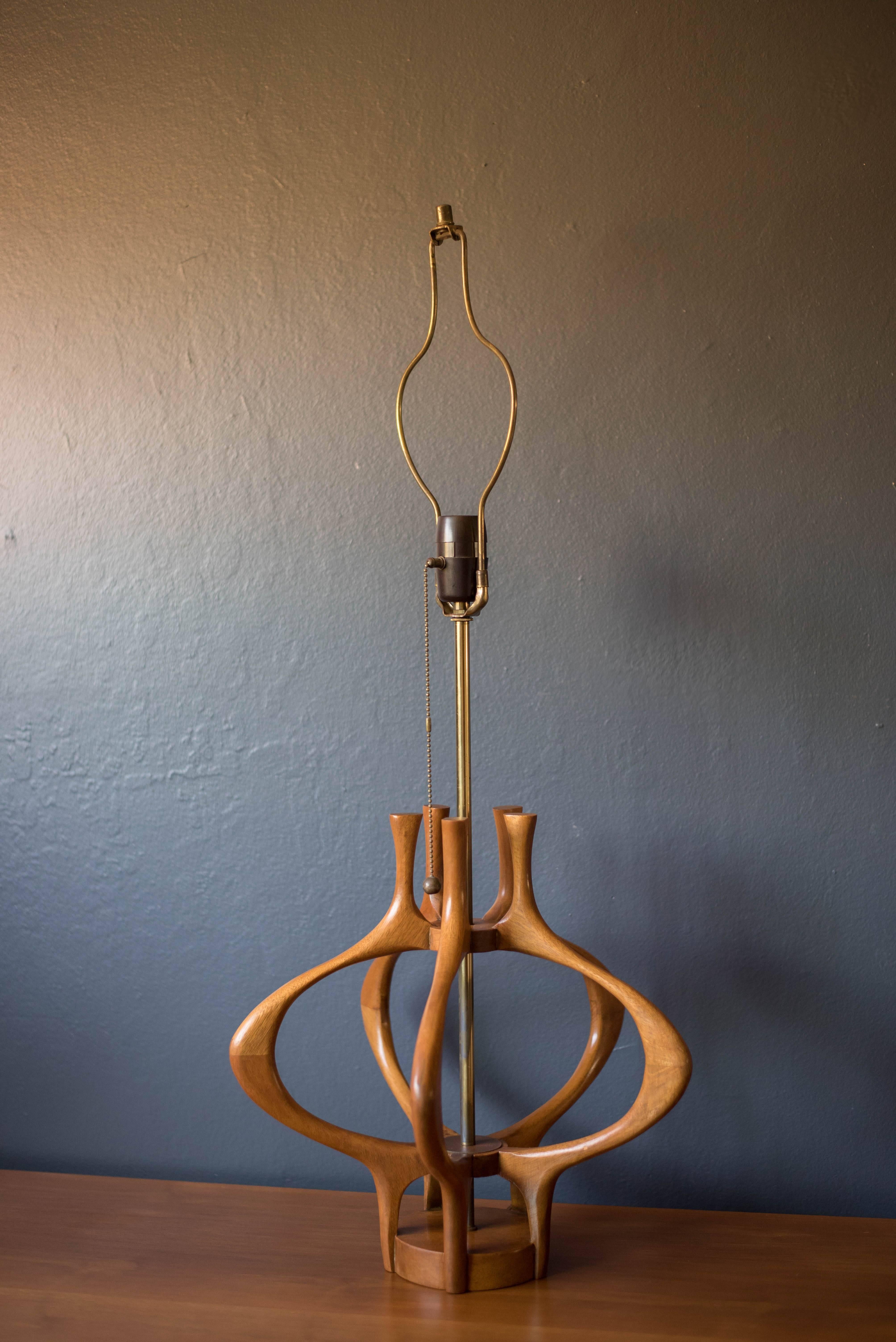 Mid-Century Modern lamp designed by Modeline, circa 1960s. This sculptural piece includes brass accents and a three way switch. Shade is not included.



Offered by Mid Century Maddist