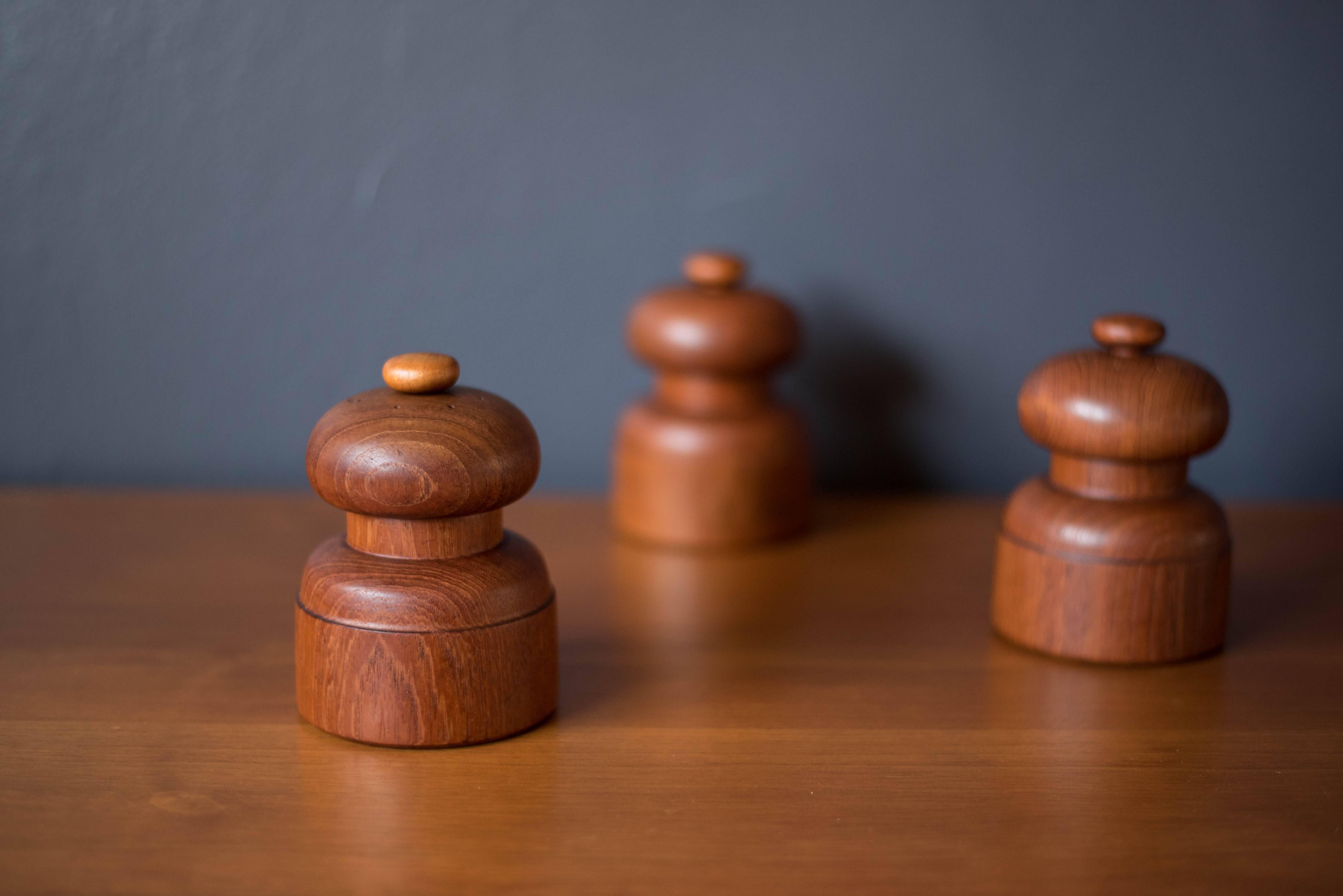 Mid-Century Modern collectible pepper grinders designed by Jens Quistgaard for Dansk. Each piece is made of teak and is marked Denmark on the bottom. Price is for each.