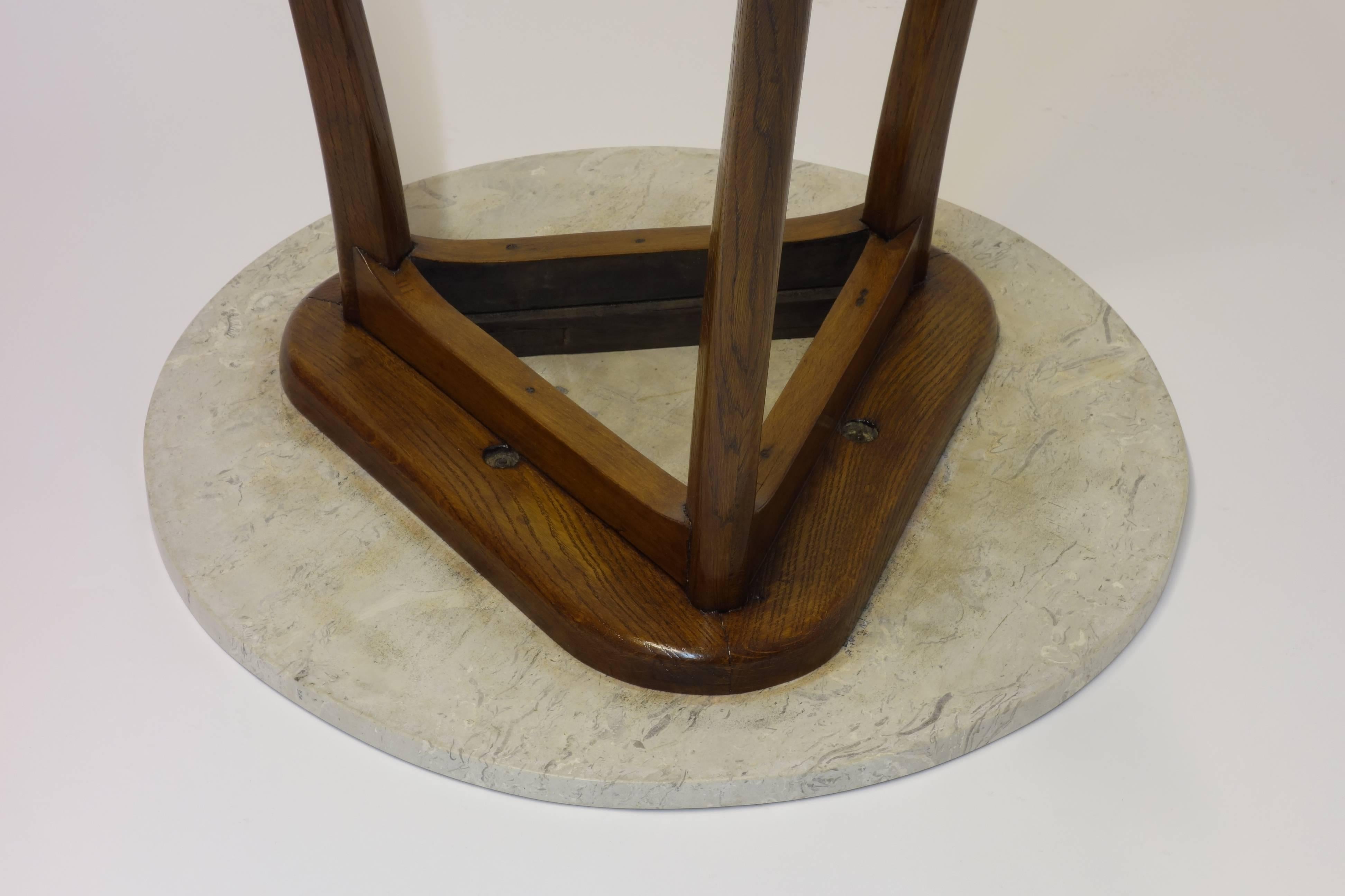 Rare side table attributed to Josef Frank, with a basis framework made of oak and solid circular stone tabletop. An early and unusual piece.