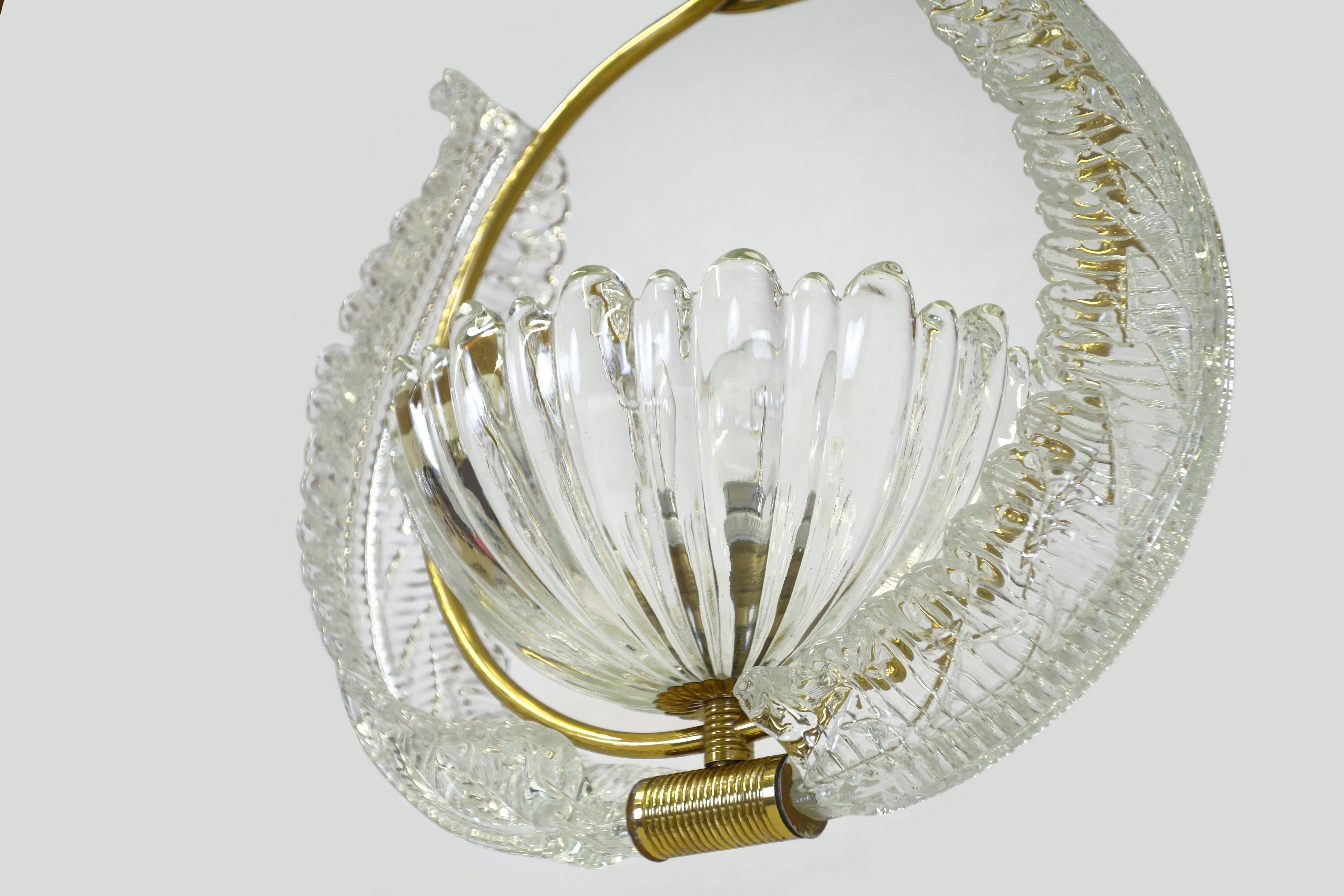 Enchanting little pendant lamp with glass leaves a centered cup and rich details by Barovier and Toso.