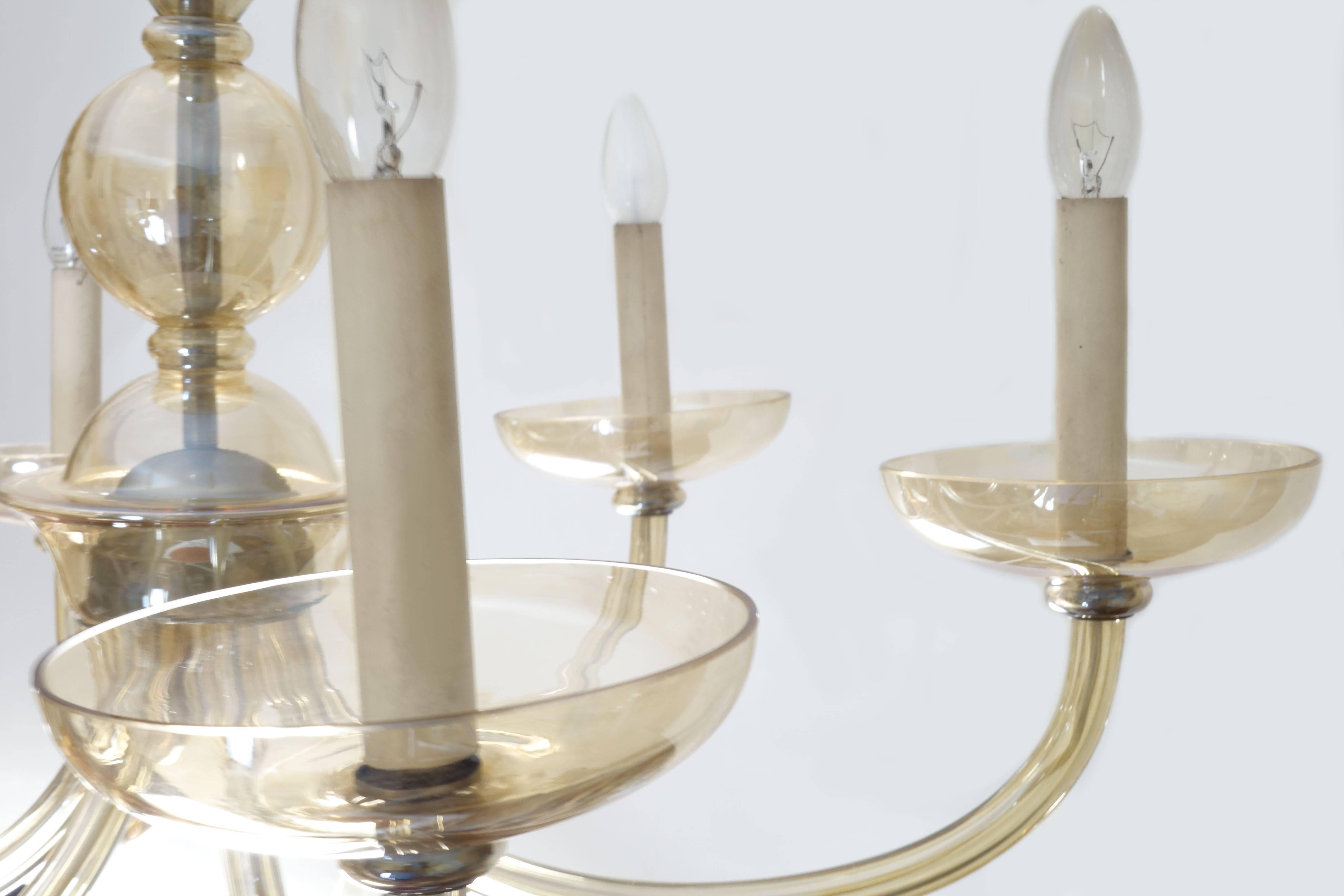 Large chandelier in translucent amber shade attributed to Lobmeyr; six arms with each one bulb, in mint condition.