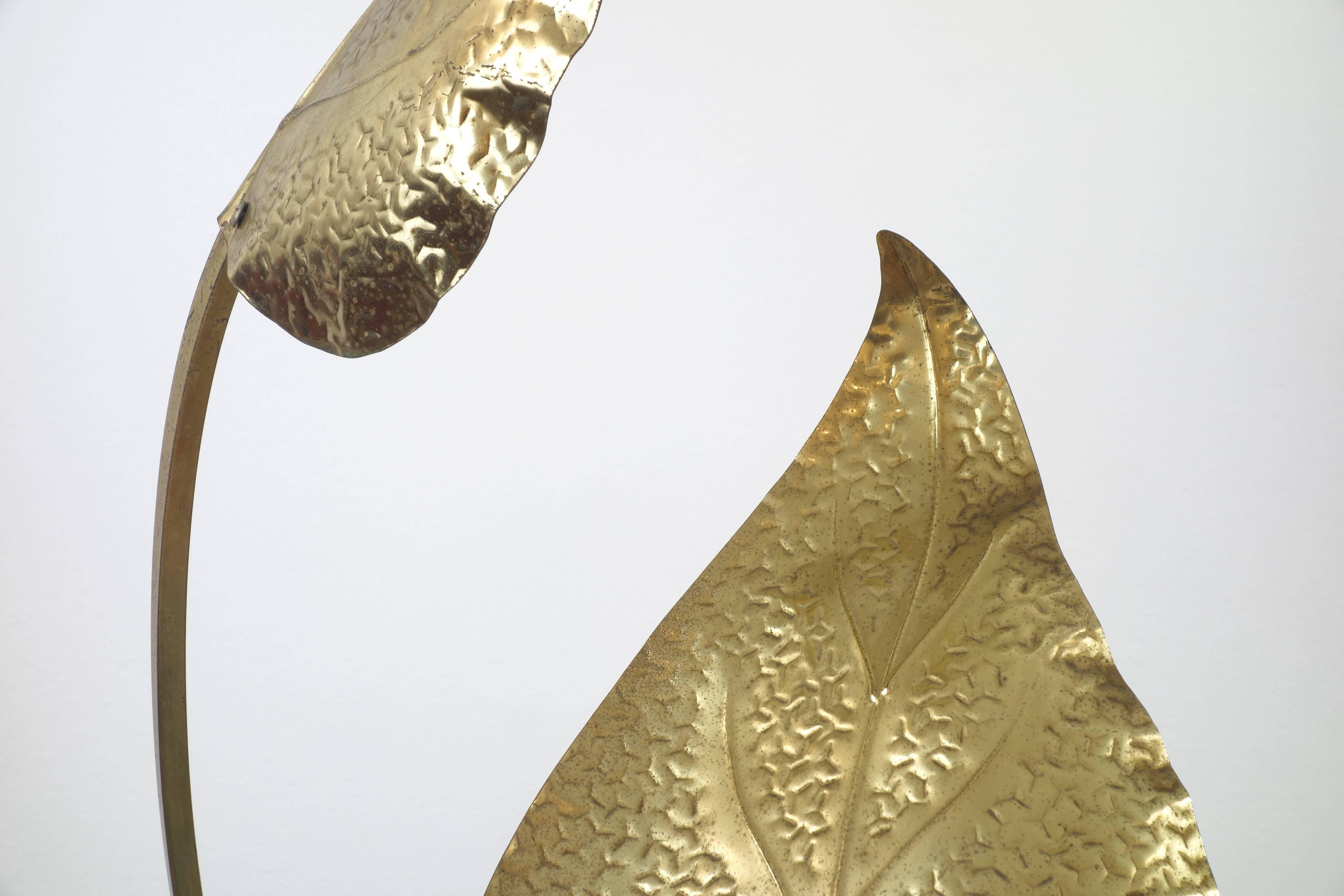 Tomasso Barbi floor lamp “Rhubarb” with leaves, Italy, 1970s. Handmade hammered brass.