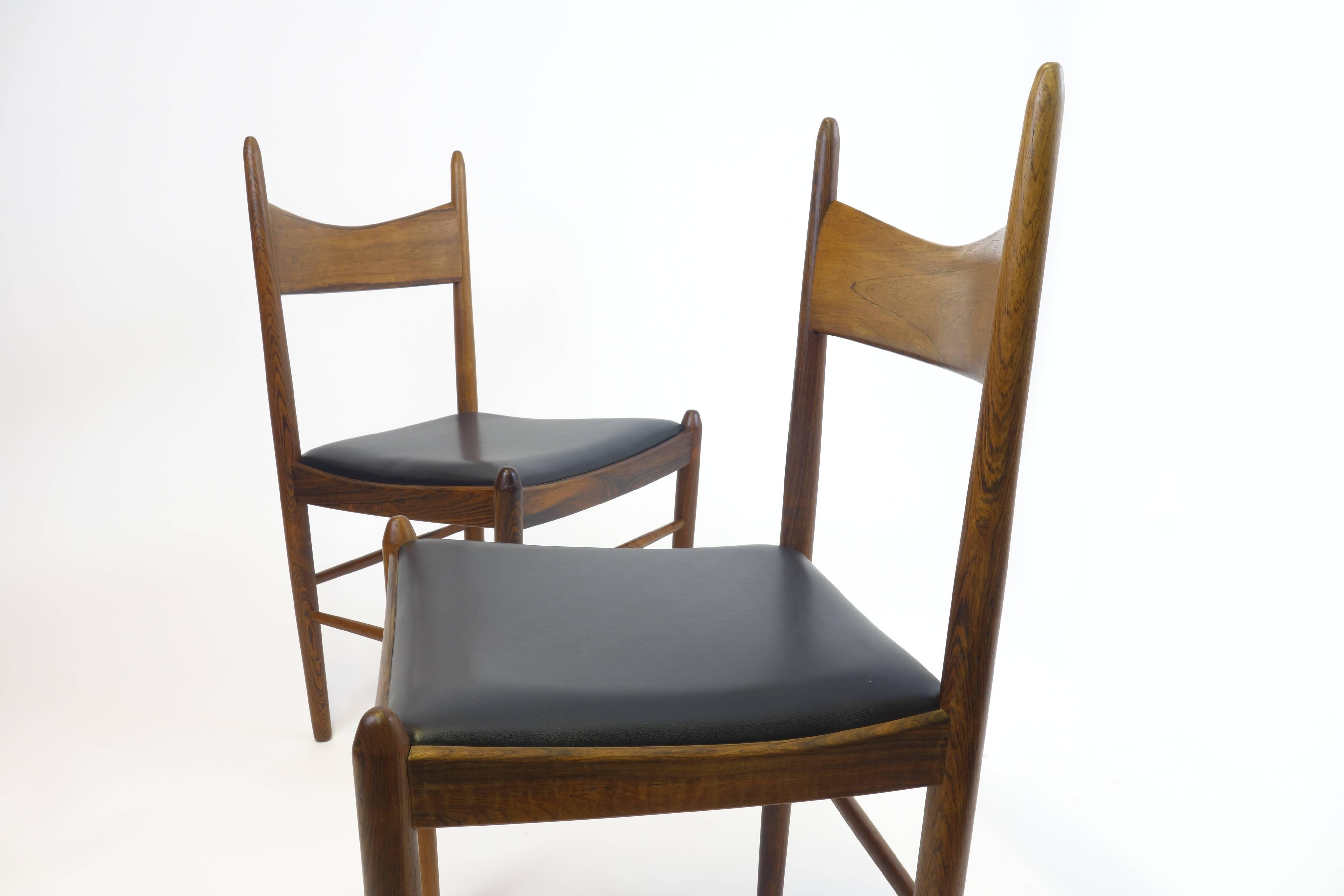 Four pieces of dining chairs by Illum Wikkelso for Vestervig Eriksen. Rare rosewood version with sythetic leather.