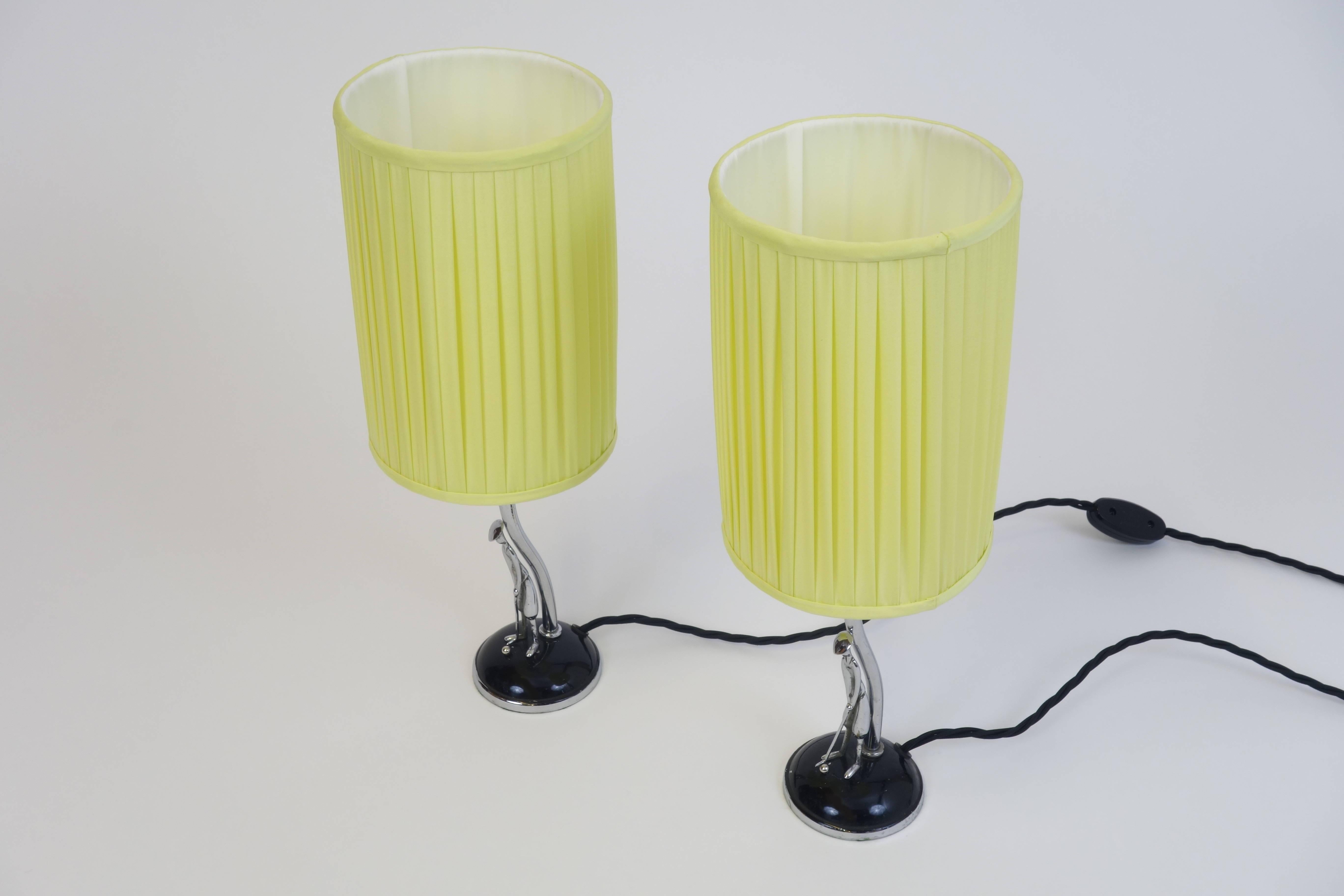 Plated Hagenauer Table Lamps, Sculptured Nickel Stands with Yellow Lampshades For Sale