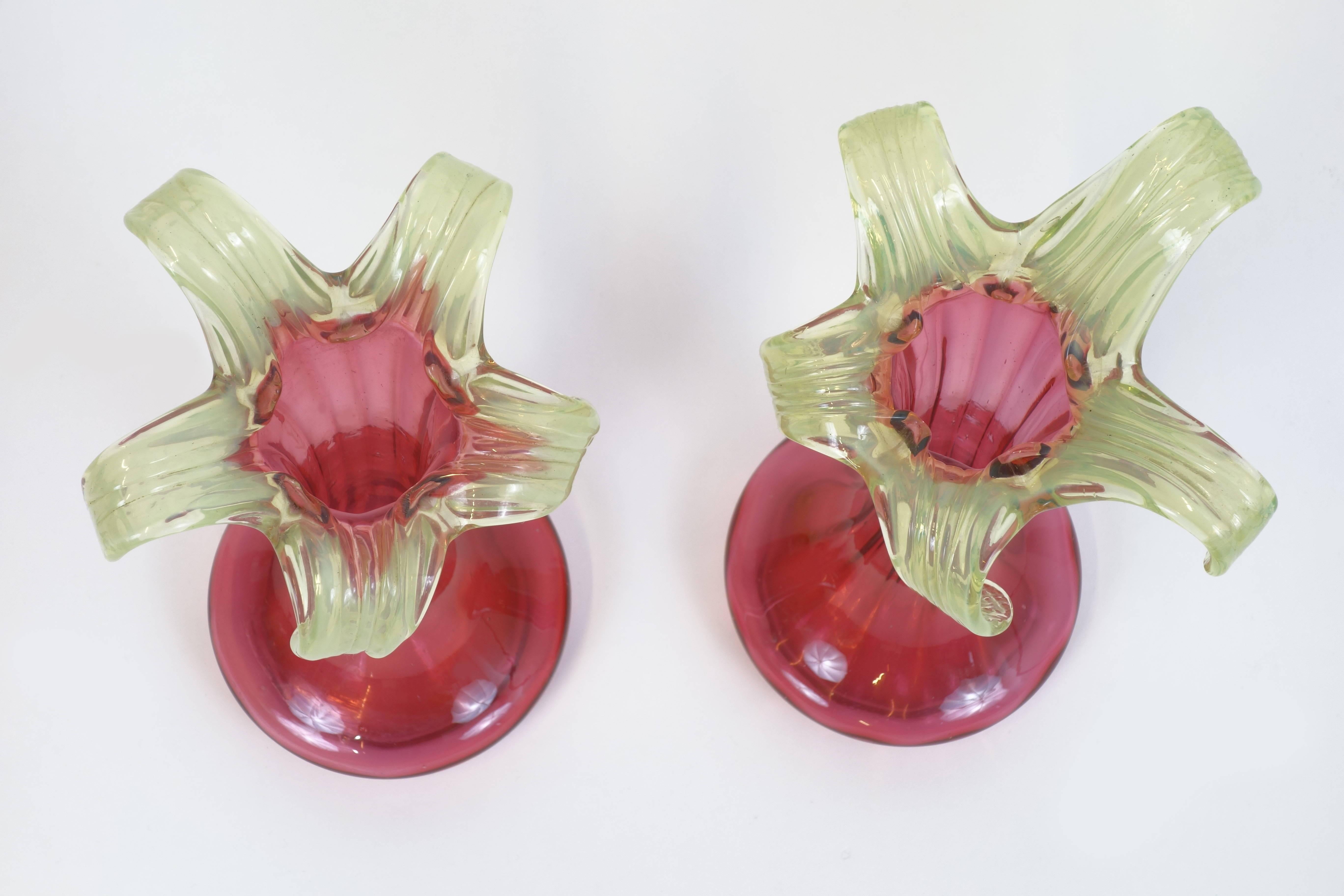Pair of historical lily shaped vases of the period Art Nouveau. Handblown glass showing complementary colors.