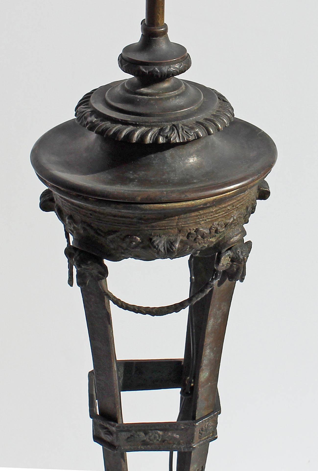 Classical bronze table lamp by E.F Caldwell after the Roman antique. Early 20th century.