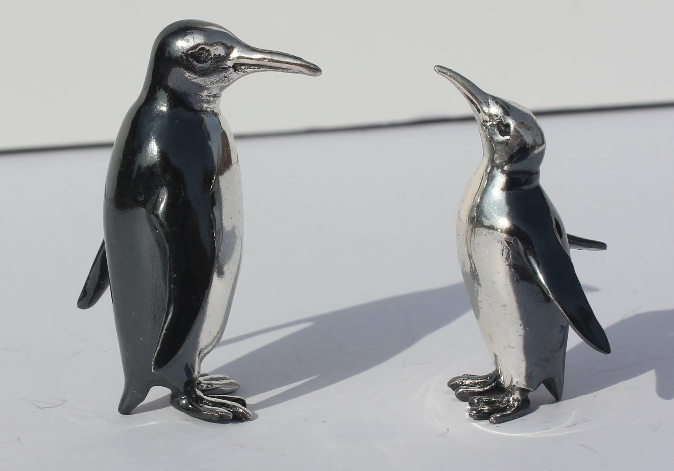 Two-toned Italian sterling penguin figures. Larger 2