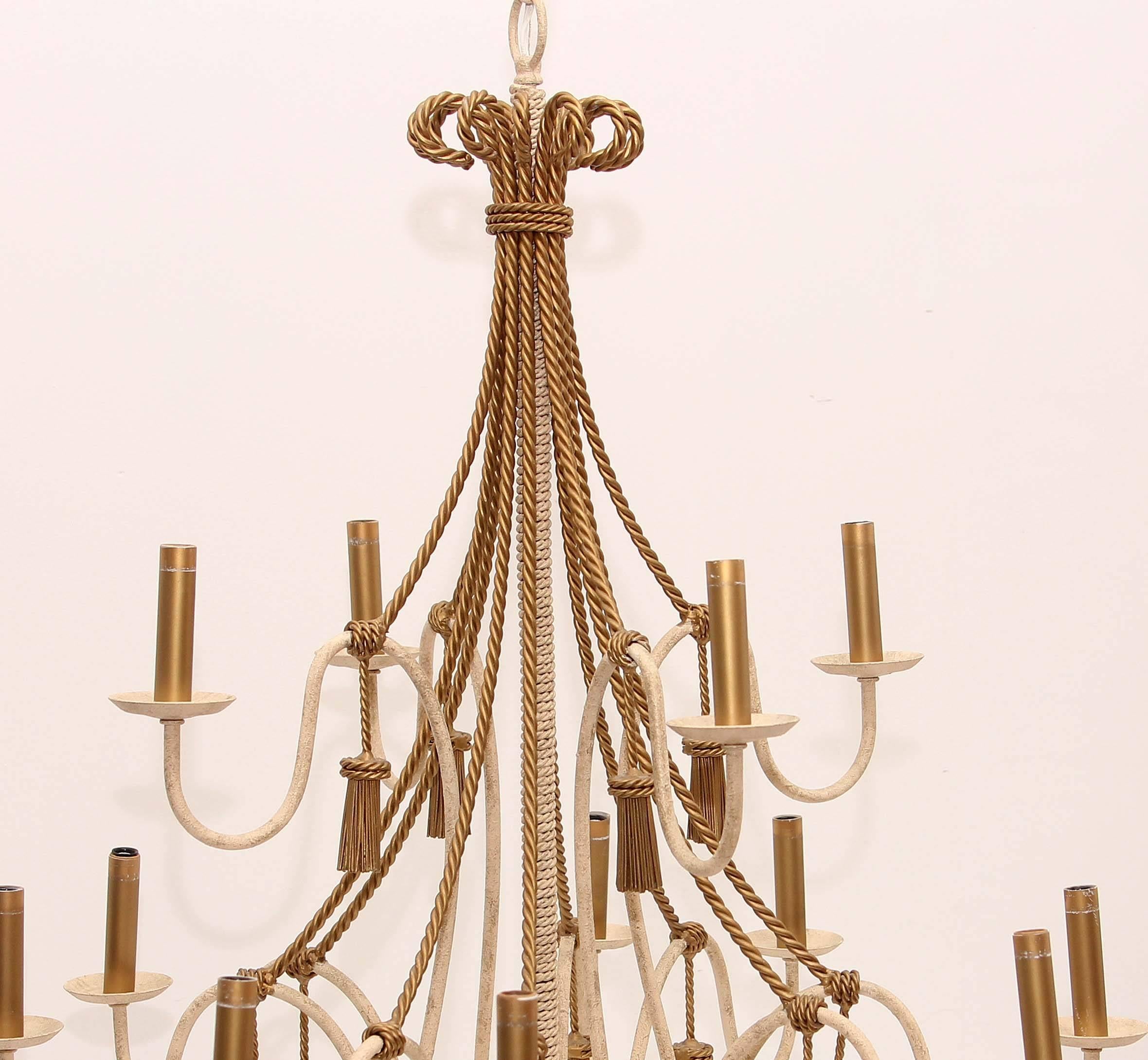 Pair of 12 light  neoclassical style chandeliers. With gilt metal rope and gilt metal tassels. Late 20th century.