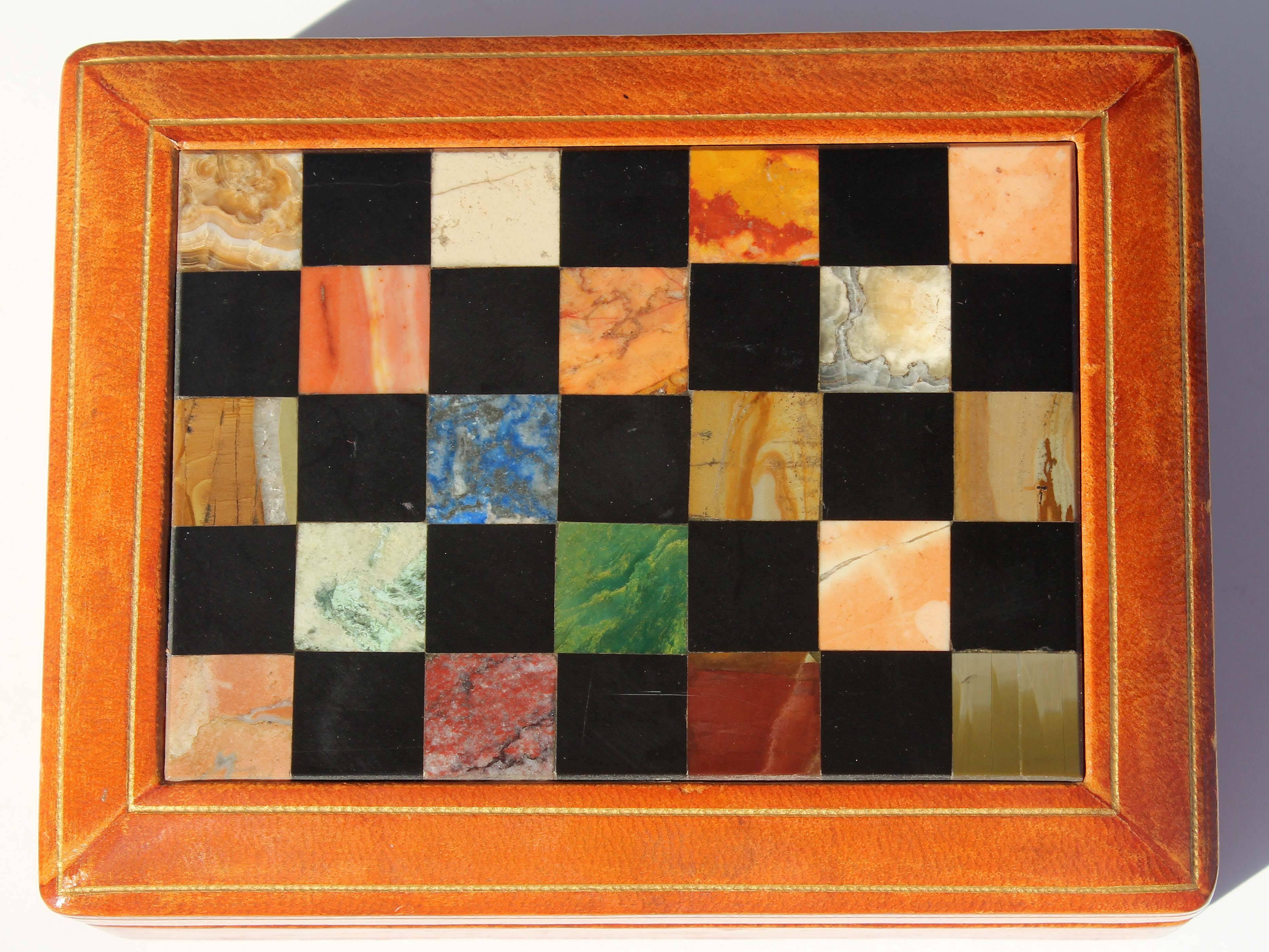 Fine Italian leather box with exotic stone inlaid top.