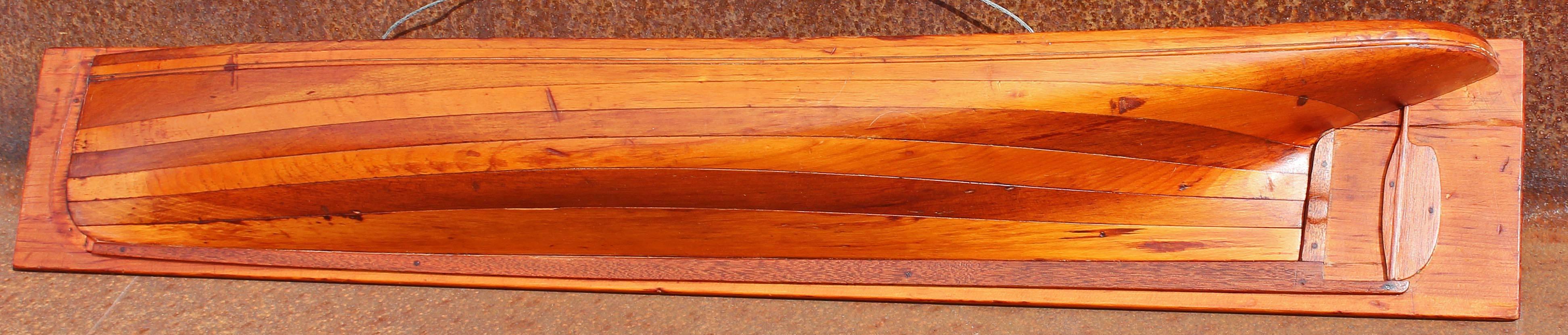 Handmade antique ships hull model, American, 19th century. Carved pine and mahogany. Warm old patina.