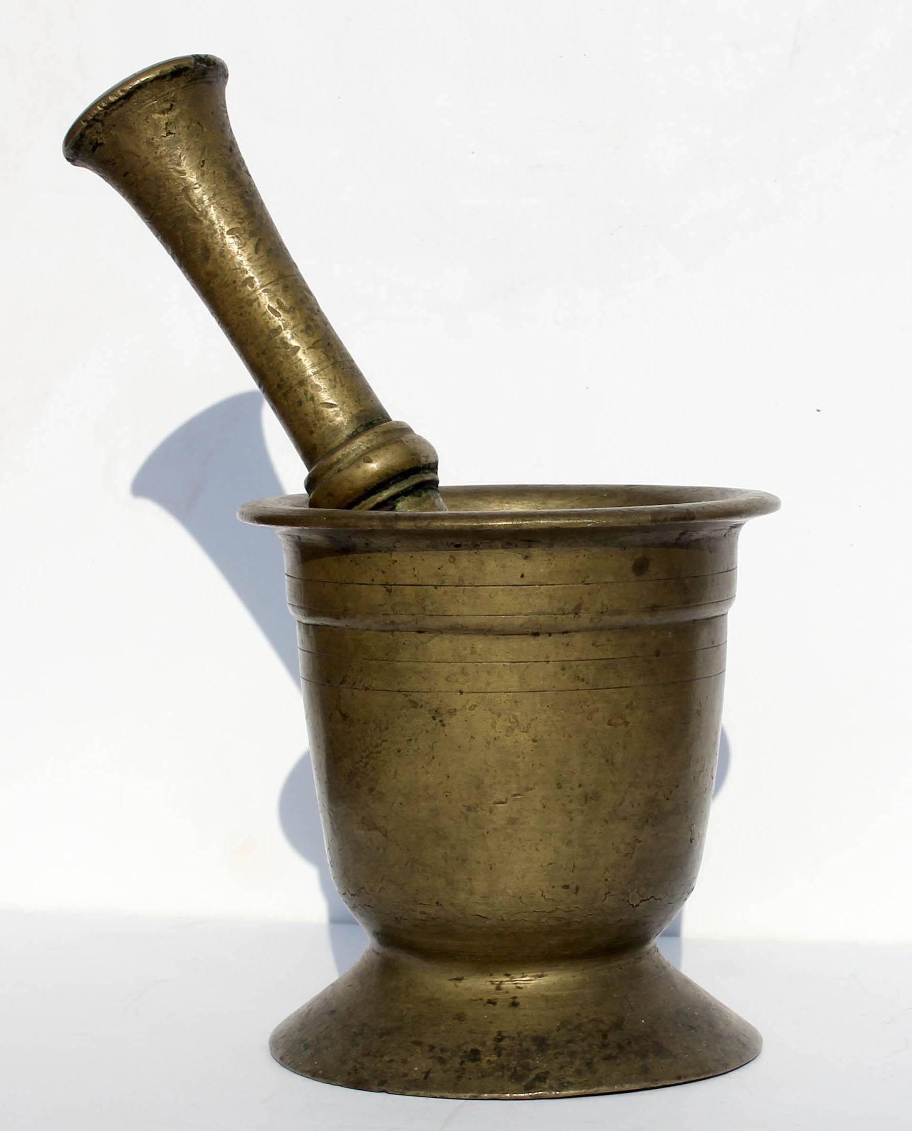 18th century brass mortar and pestle. Very heavy casting. Lots of great old wear.