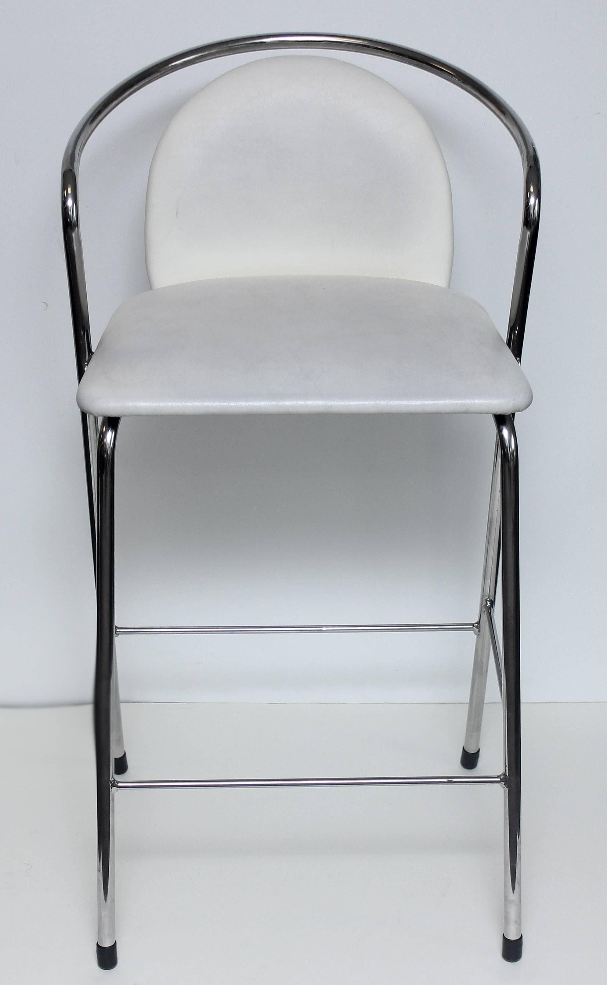 Set of five modern Thonet chrome and vinyl bar stools.