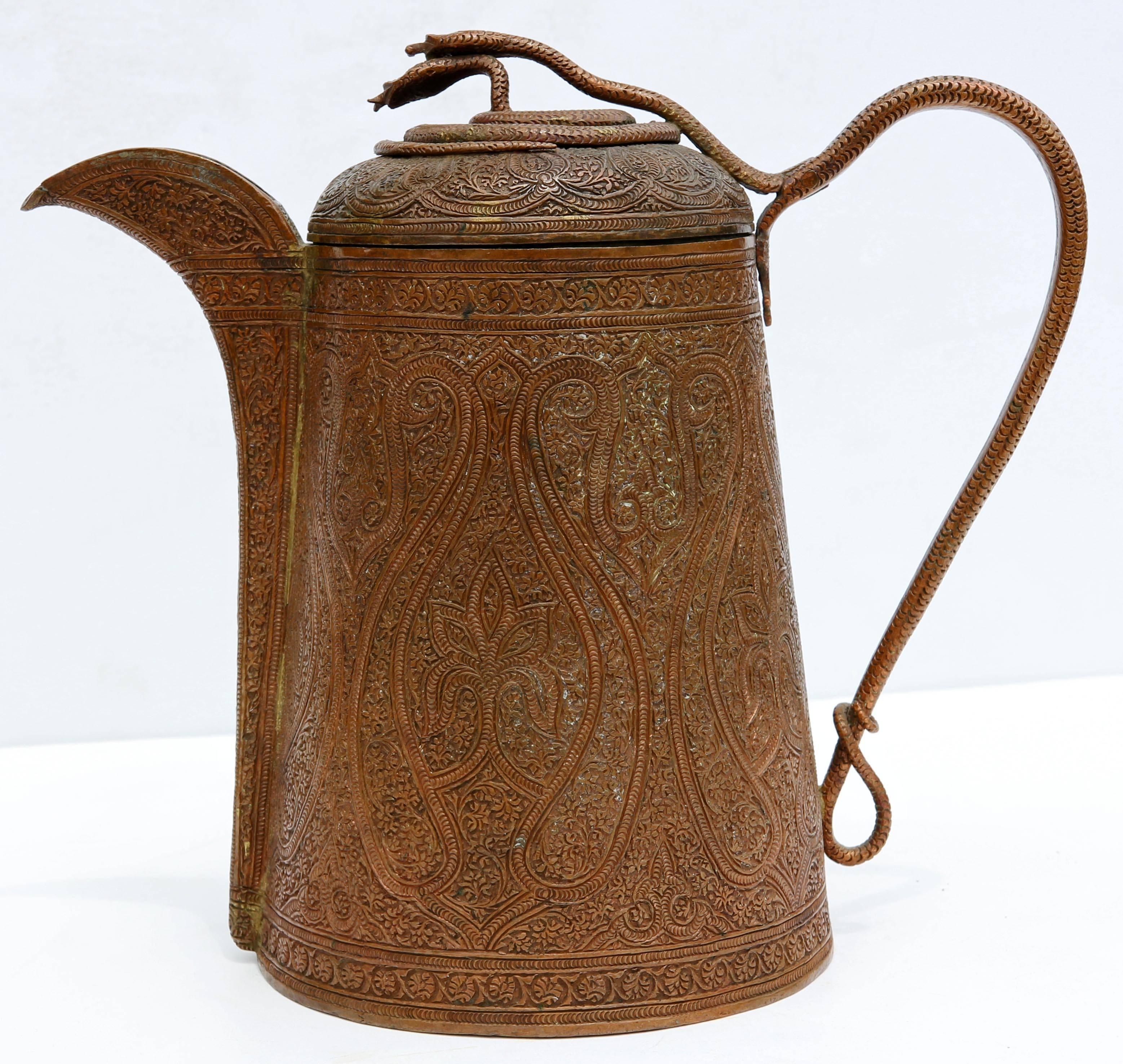 19th century Persian Islamic coffee pot. Engraving work is exceptional.
