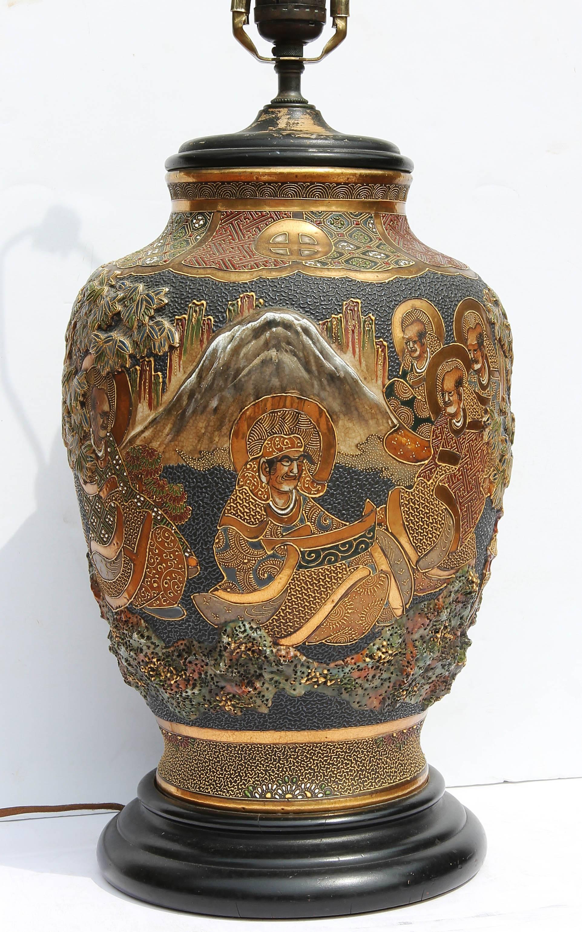 Antique Japanese Satsuma lamp. Gilt and glazed decoration, showing scholars in a landscape. Exceptional quality and depth. Circa 1920.