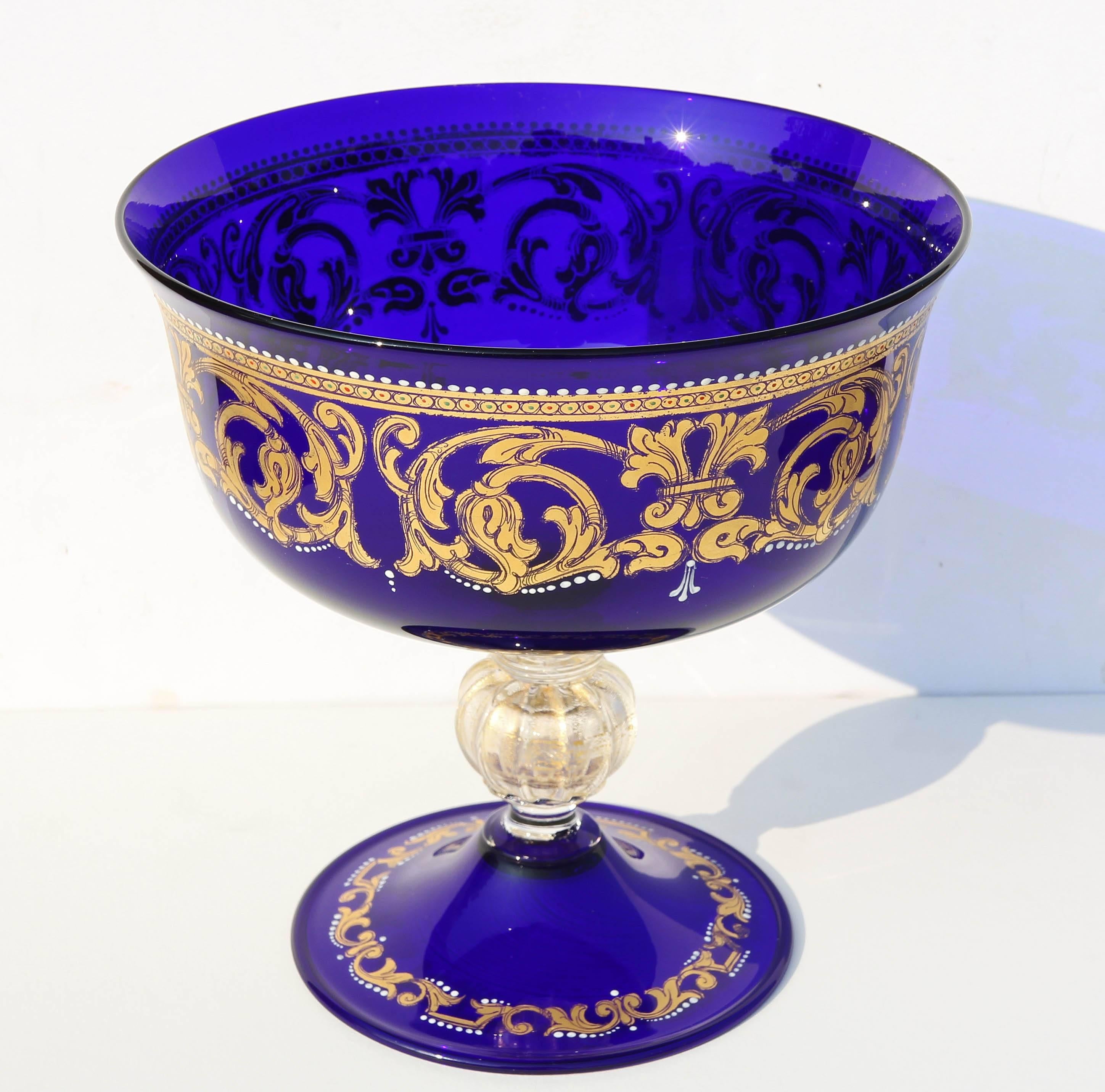 Vintage handmade Murano glass centrepiece by Salviati. Cobalt blue glass decorated with gold gilt and enamel. Signed on bottom, circa 1920s.