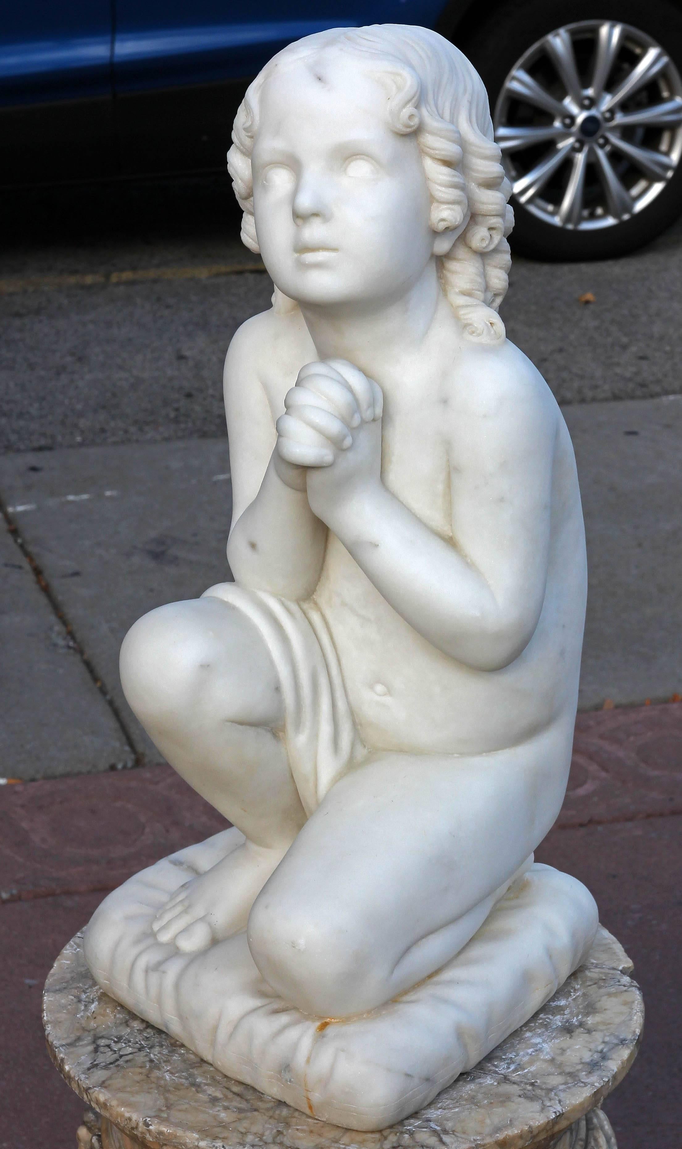 Antique neoclassical marble sculpture of a young boy kneeling. Finely carved. circa mid-19th century. Please, contact us for shipping options.