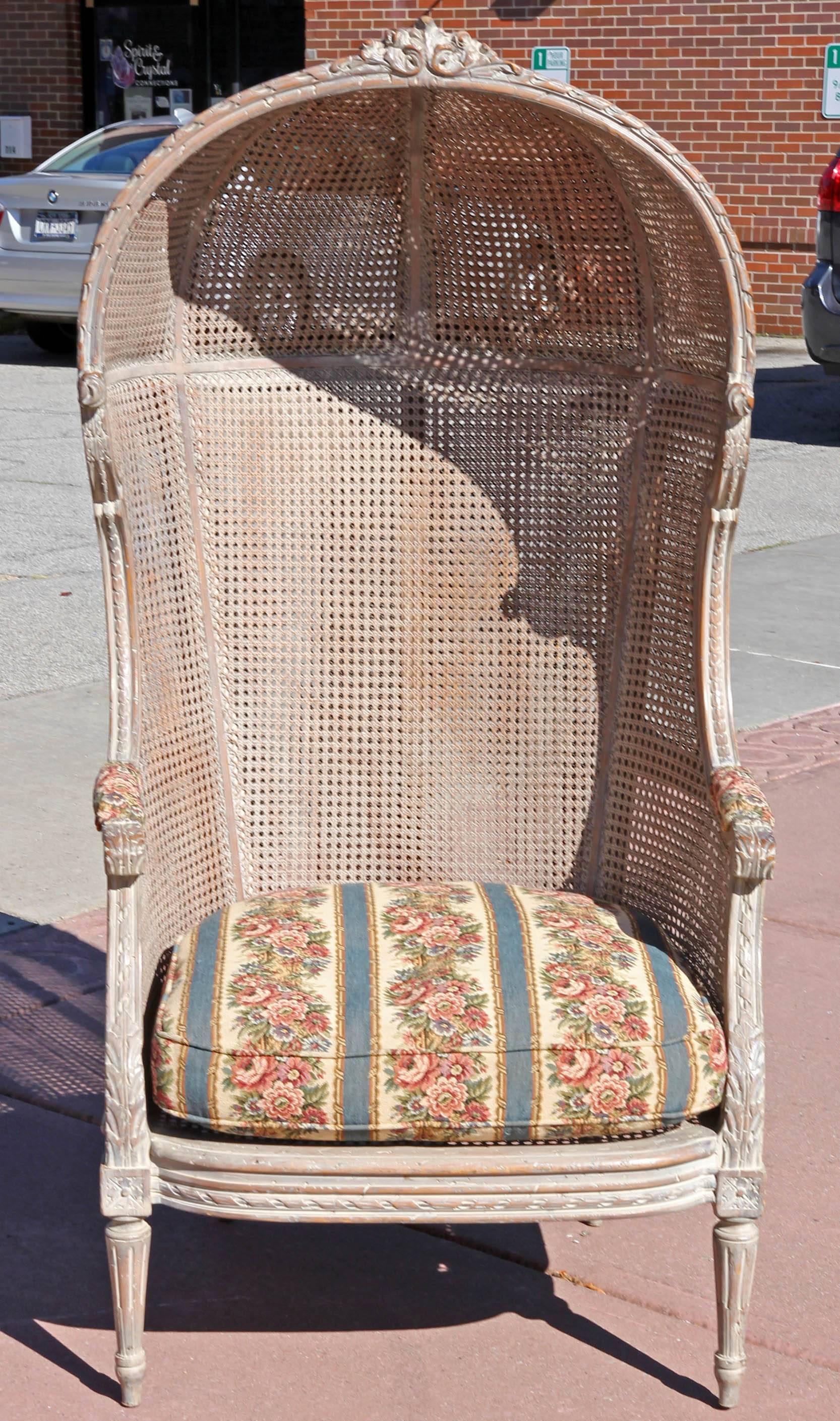 Louis XVI style caned hooded chair. Pickled beechwood.