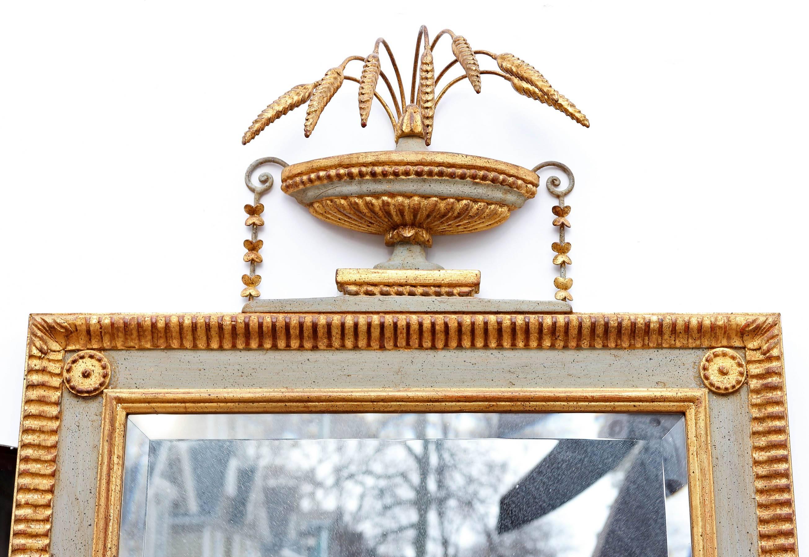 Gilt and painted Italian neoclassical style console mirror.
