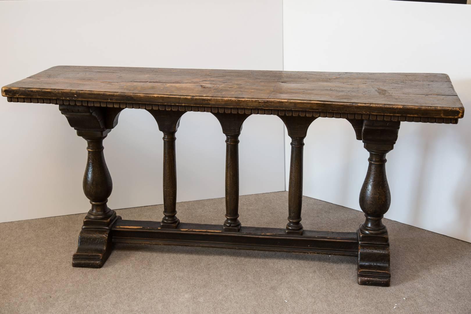 Rustic Italian Baroque style trestle table. 18th century top with early 20th century base.