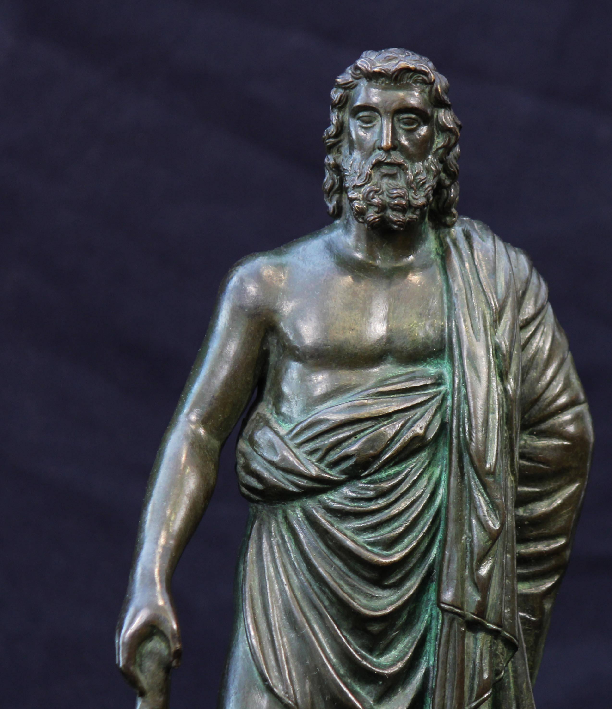 Fine antique patinated bronze sculpture of Asclepius Greek god of medicine. Mounted on slate base, early 20th century.