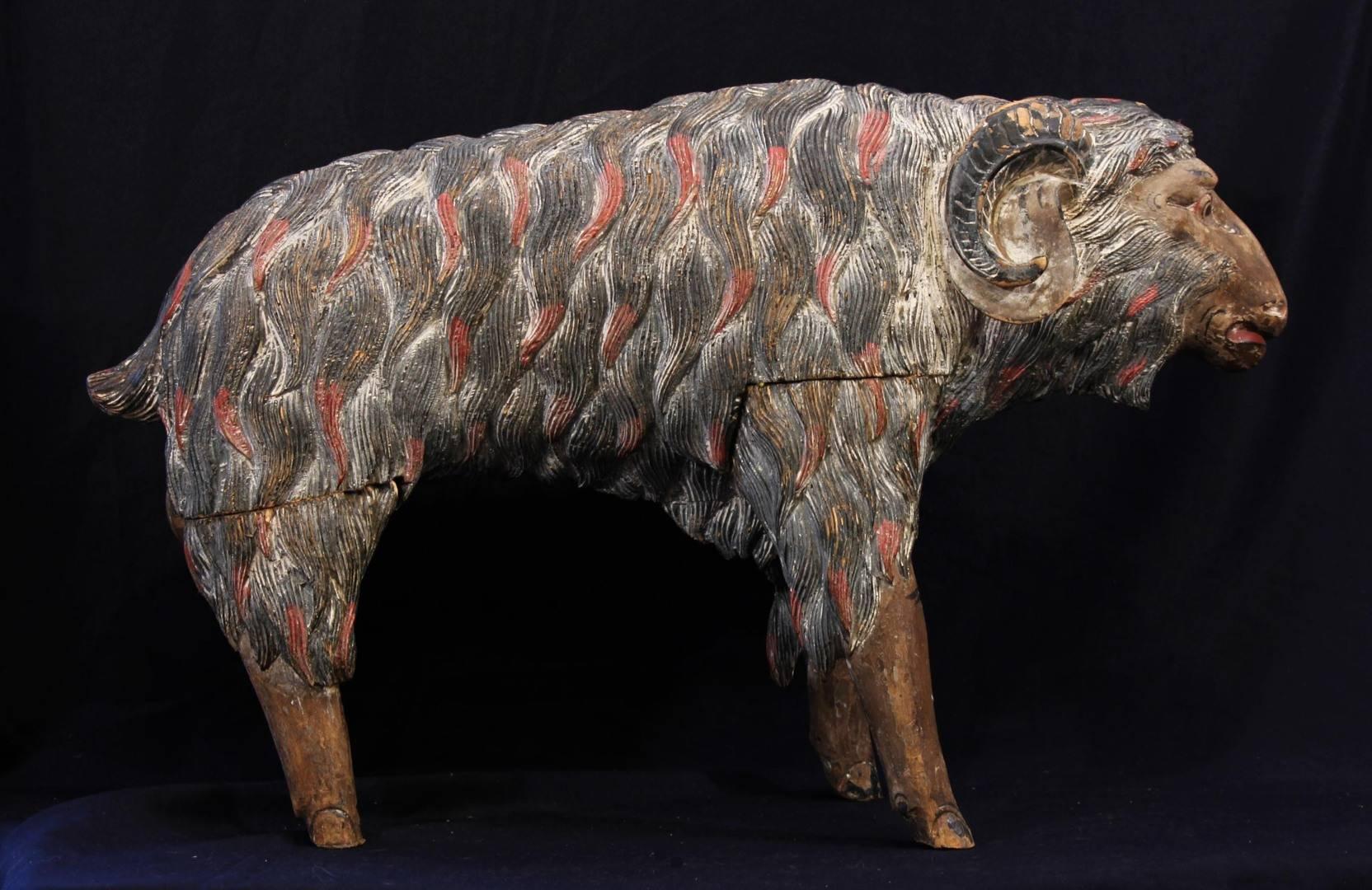  Early 20th century Bali sculpture of a ram. Original old paint. A fun piece. Nicely carved and painted.