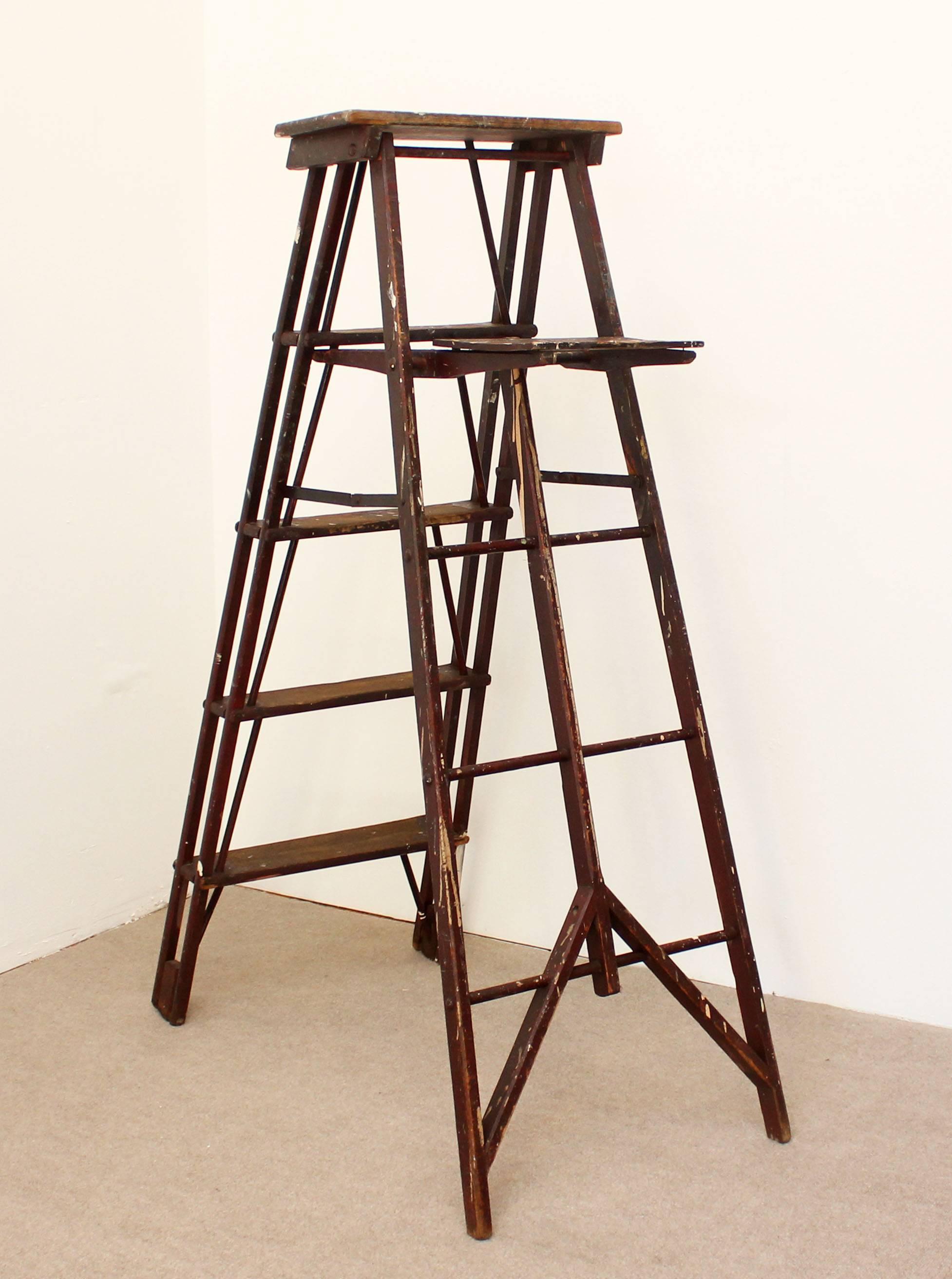 Vintage 1920s wood painter's ladder. Lots of character.