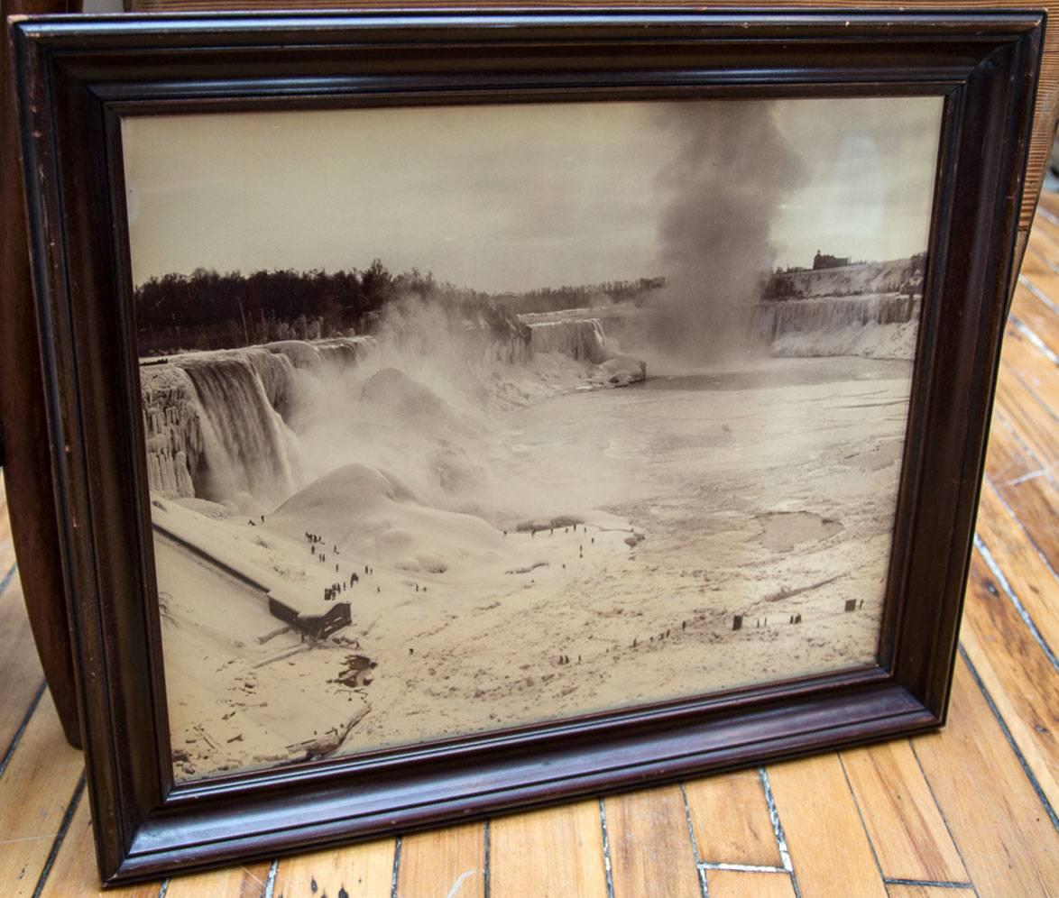 Mammoth albumen photograph of  Niagara Falls frozen. Circa 1910. Original pine frame.  Provenance: Deaccessioned from The Strong Museum, Rochester, New York.