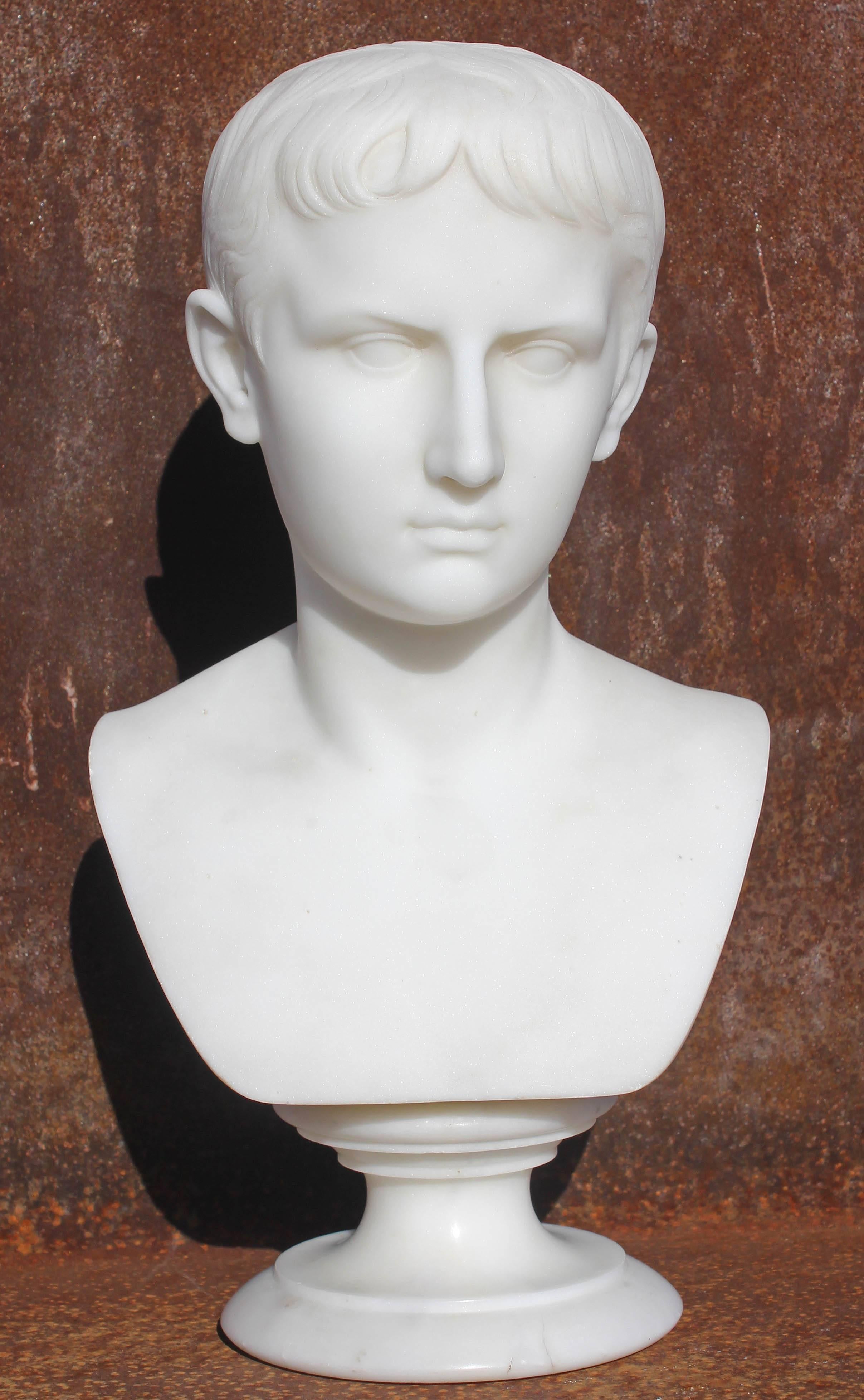 Young Augustus Caesar 19th century marble bust by Italian sculptor Pietro Bazzanti  (1842 - 1881).
  Bazzanti specialised in allegorical and genre subjects as well as copies of Antique and Renaissance sculpture. Regarded as one of the most talented