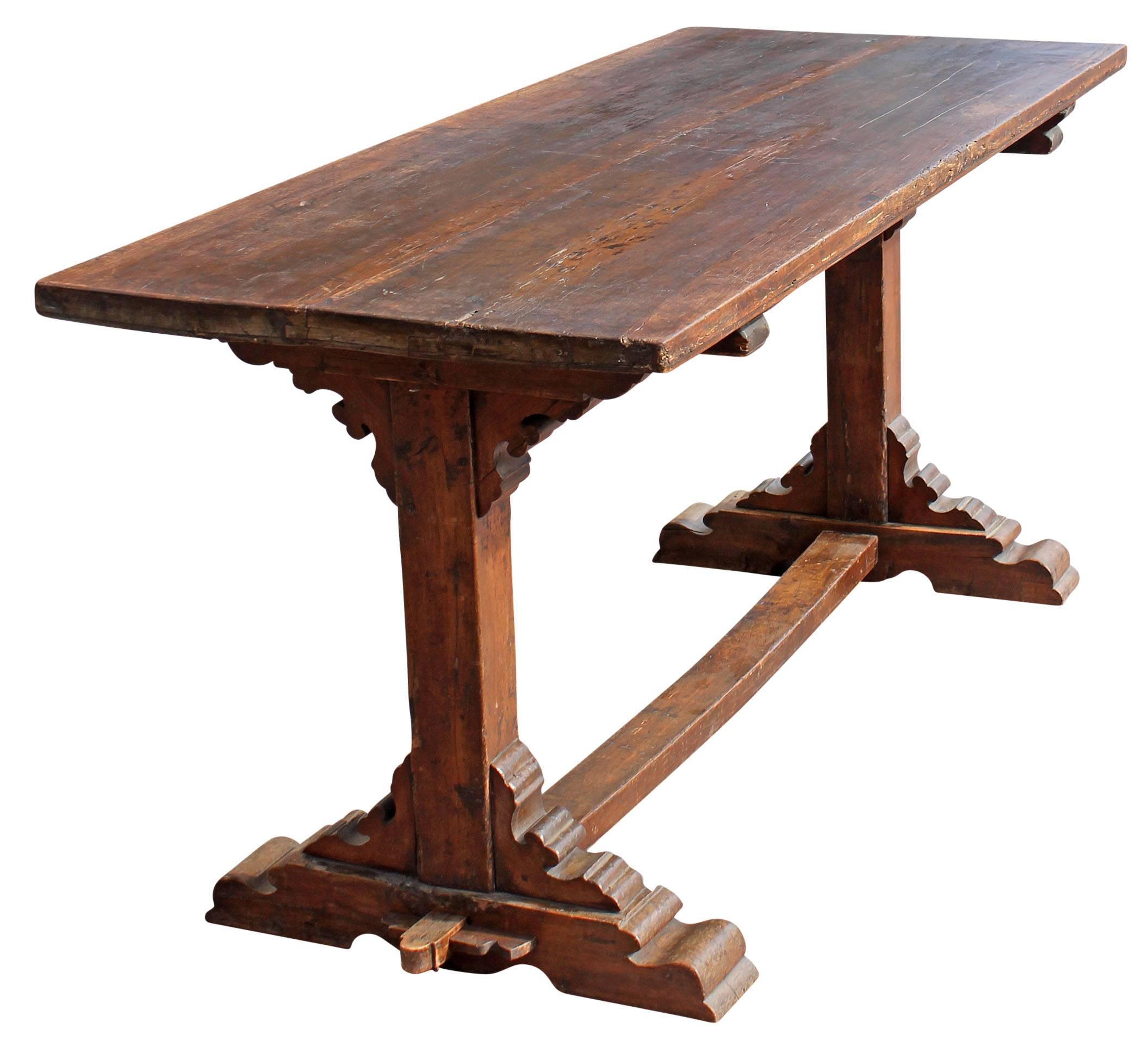  Italian Baroque 18th Century trestle library or work table. Solid walnut. Original warm patina. Mortise and tenon construction. Table disassembles into four pieces.