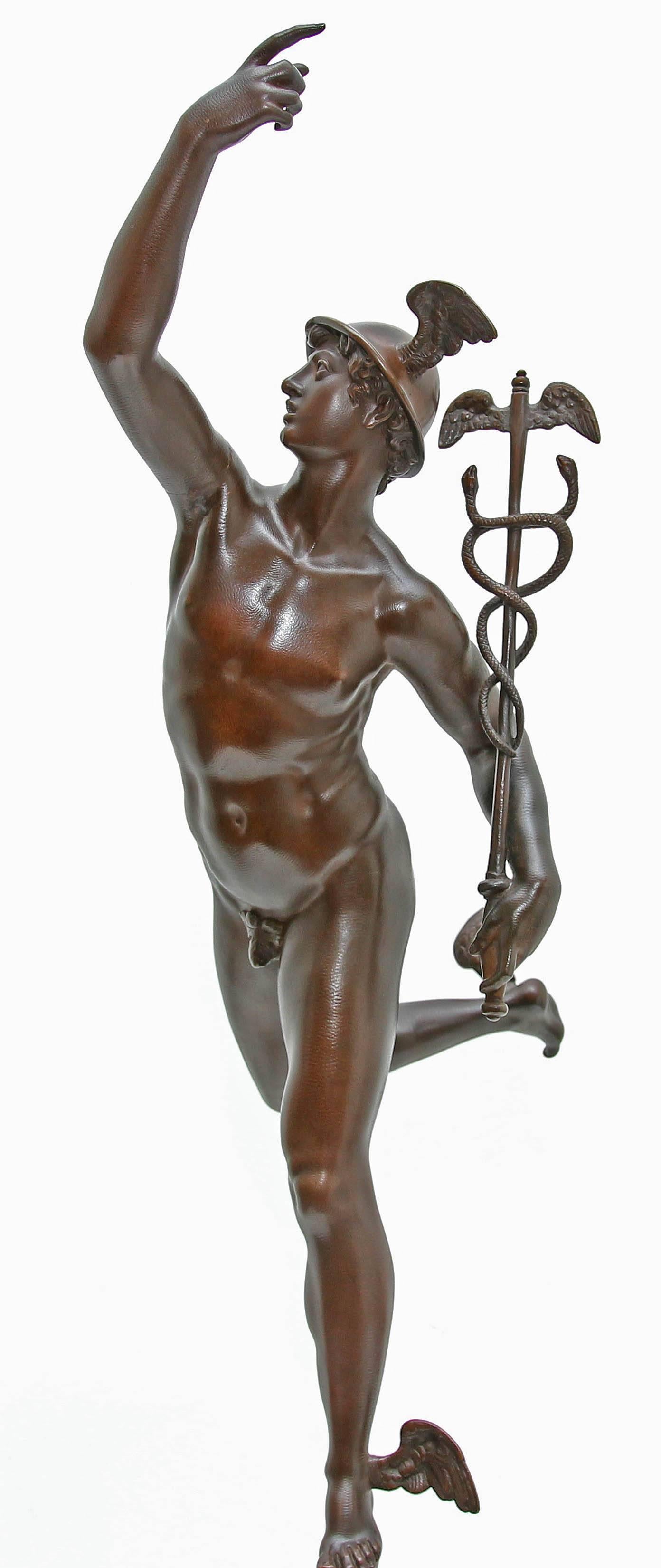 Grand Tour bronze sculpture of Mercury standing on the wind after Giambologna. Polished rouge marble pedestal. This is an exceptionally fine casting. Mid-19th century.