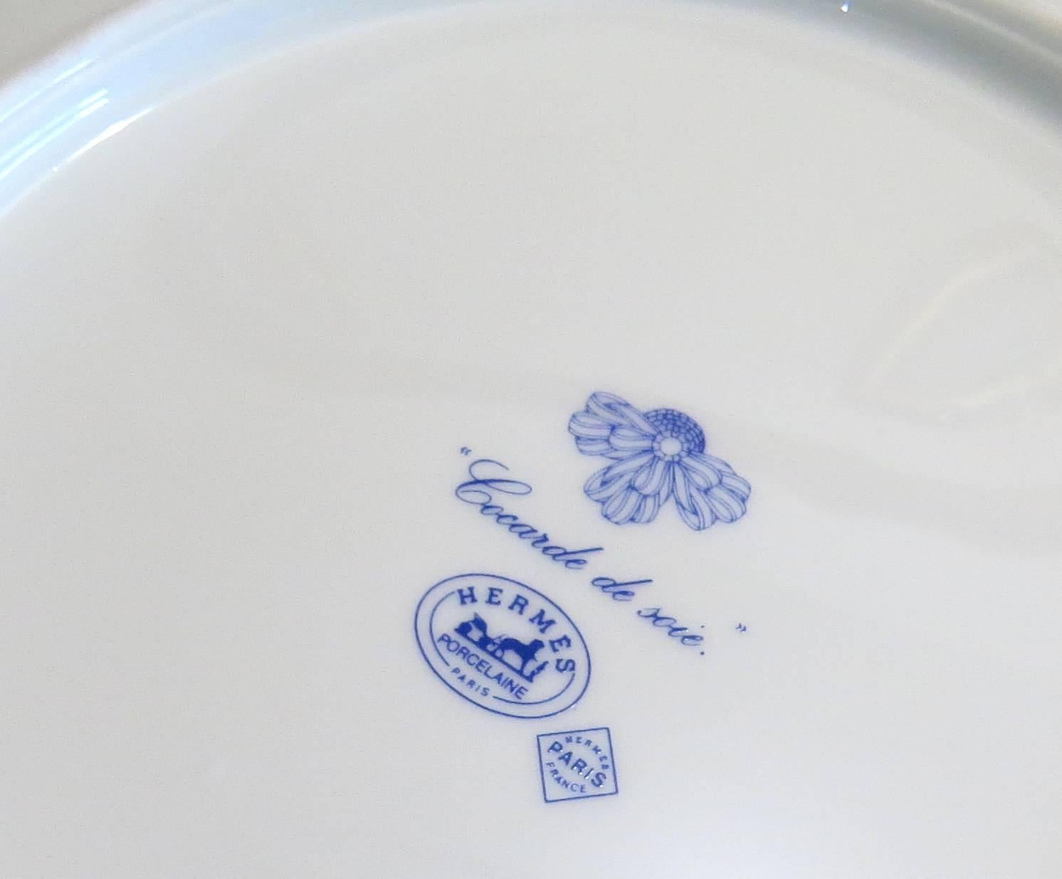 Set of 12 blue porcelain fruit dishes, crafted by Hermes for Coccard de Soir collection. Plates measure 8 5/8