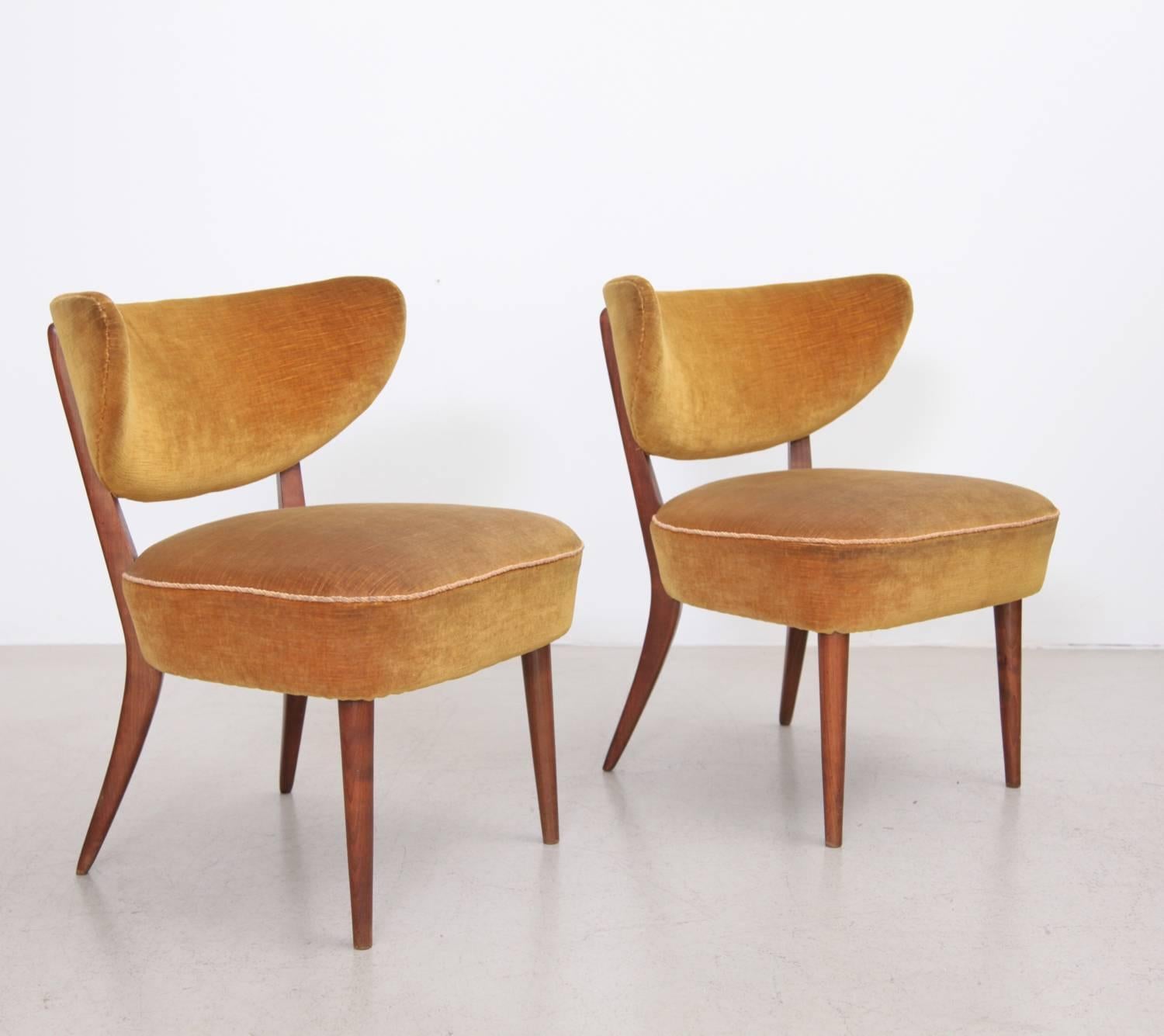 Rare pair by Traulsen architects in mohair in very good vintage condition. Very sculptural chairs.