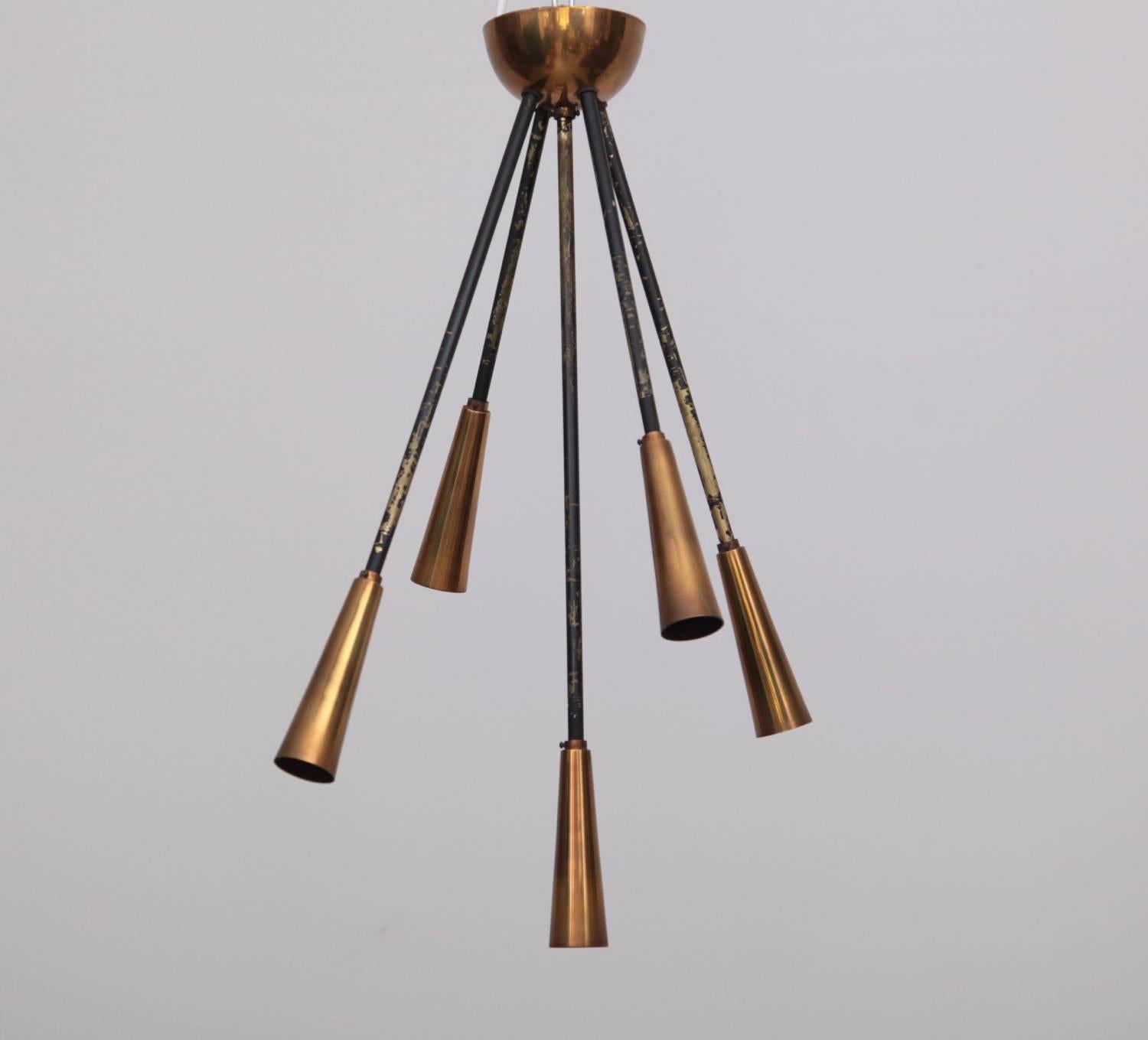 This lamp is absolute fantastic and rare. The little bulbs are hidden in the brass part so you will be blended by the light. Absolute important Italian lightning. Five x E14.

