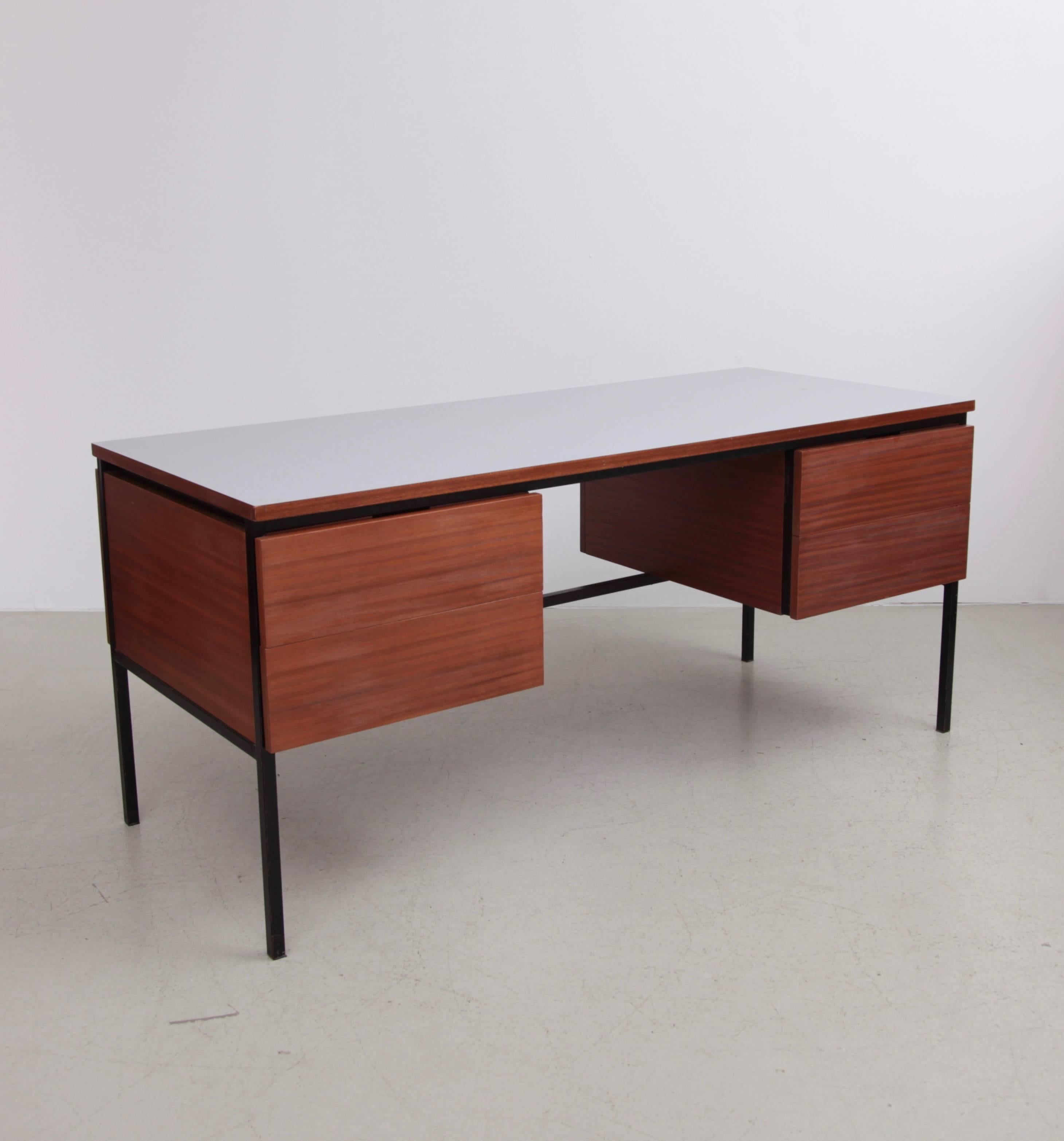 Beautiful desk designed by Pierre Guariche for Minivelle. Grey laminate top and black lacquered steel base. Mahogany wood. Excellent condition.

