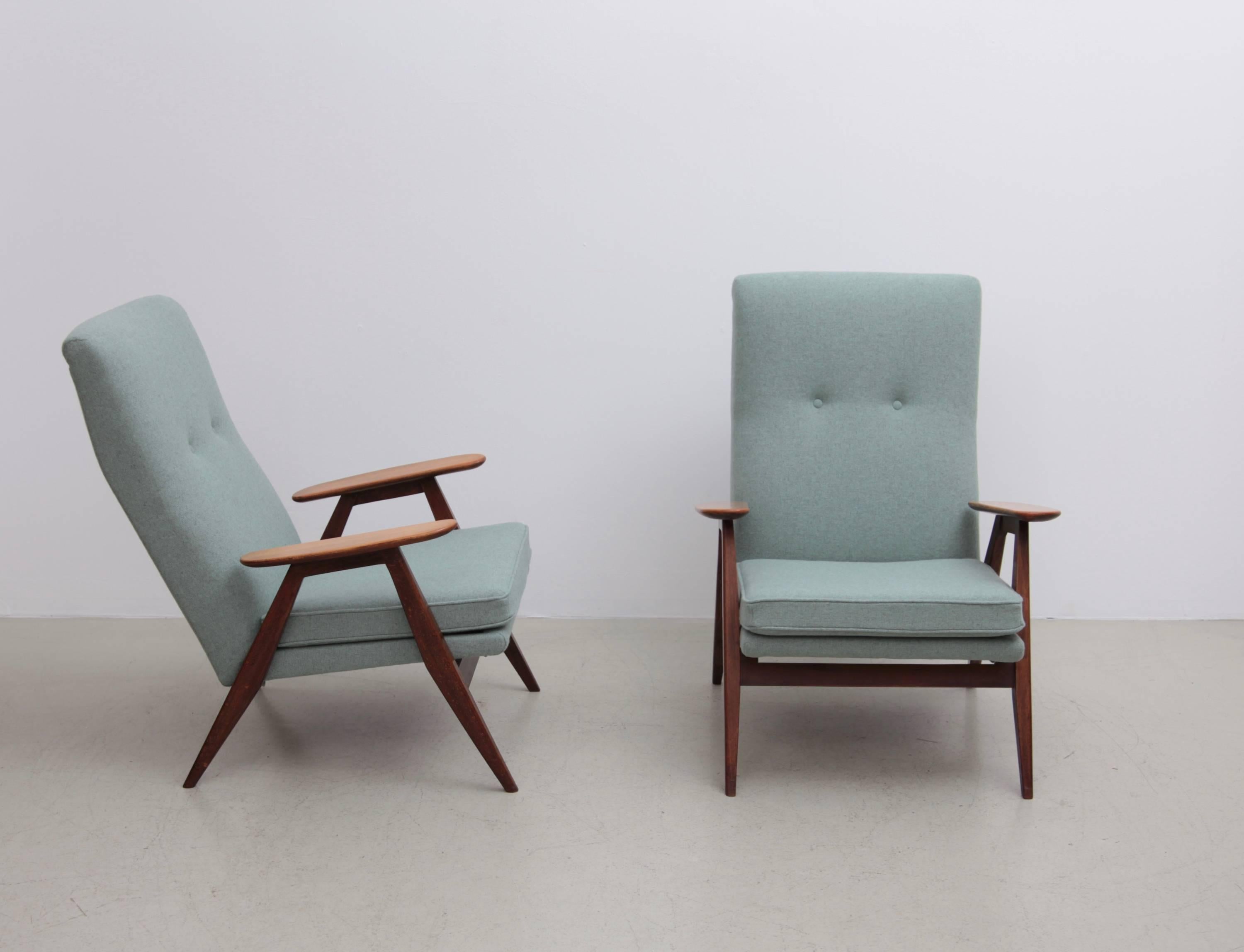 Very elegant French Mid-Century pair of lounge chairs in new Kvadrat/Maharam fabric in excellent condition.
