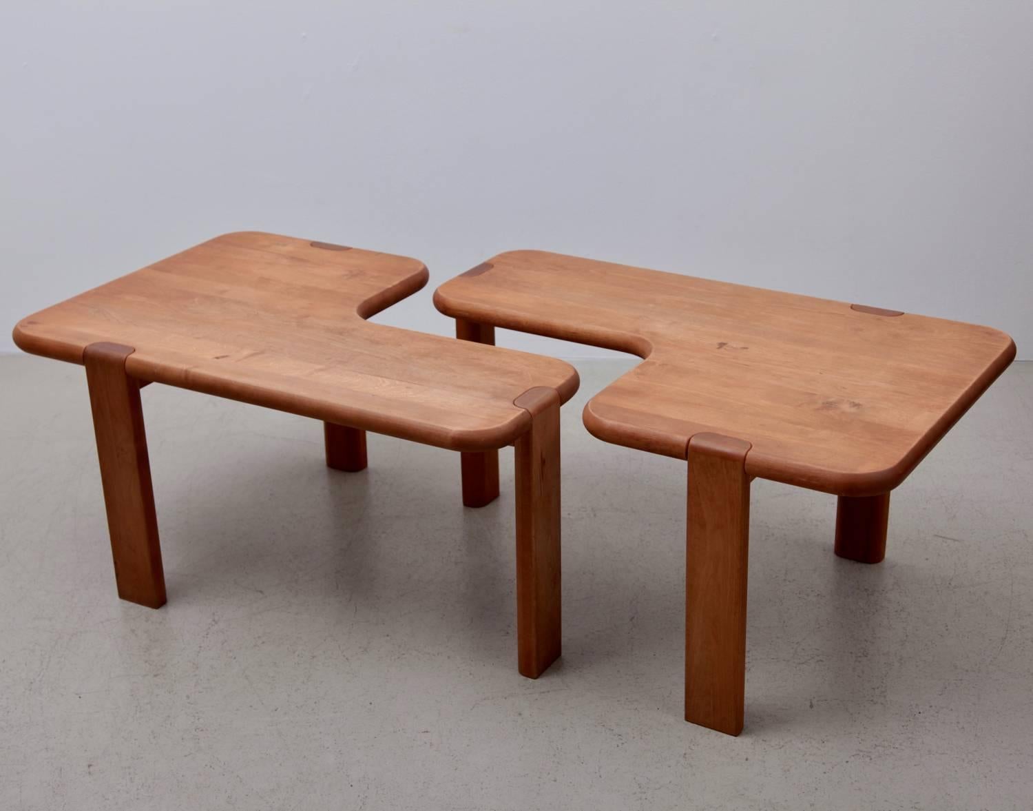 Sculptural pair of Aksel Kjersgaard coffee tables. One has a little stain spot which does not effect the piece at all. Heavy and solid.