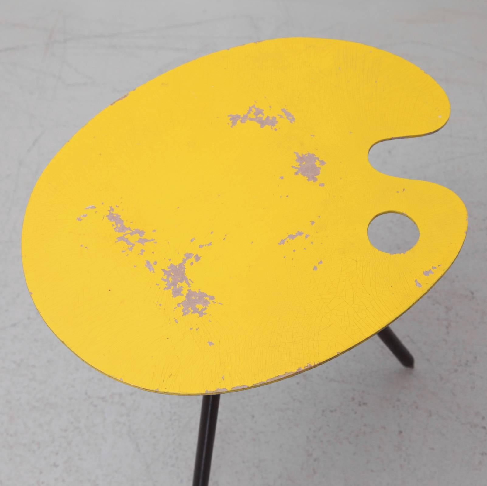 Palette table designed by Lucien De Roeck and manufactured for Bois Manu, Belgium, 1958. Designed by for the World Expo in Brussels in Belgium in 1958. The table is signed and the yellow top shows strong patina. Original vintage condition.

