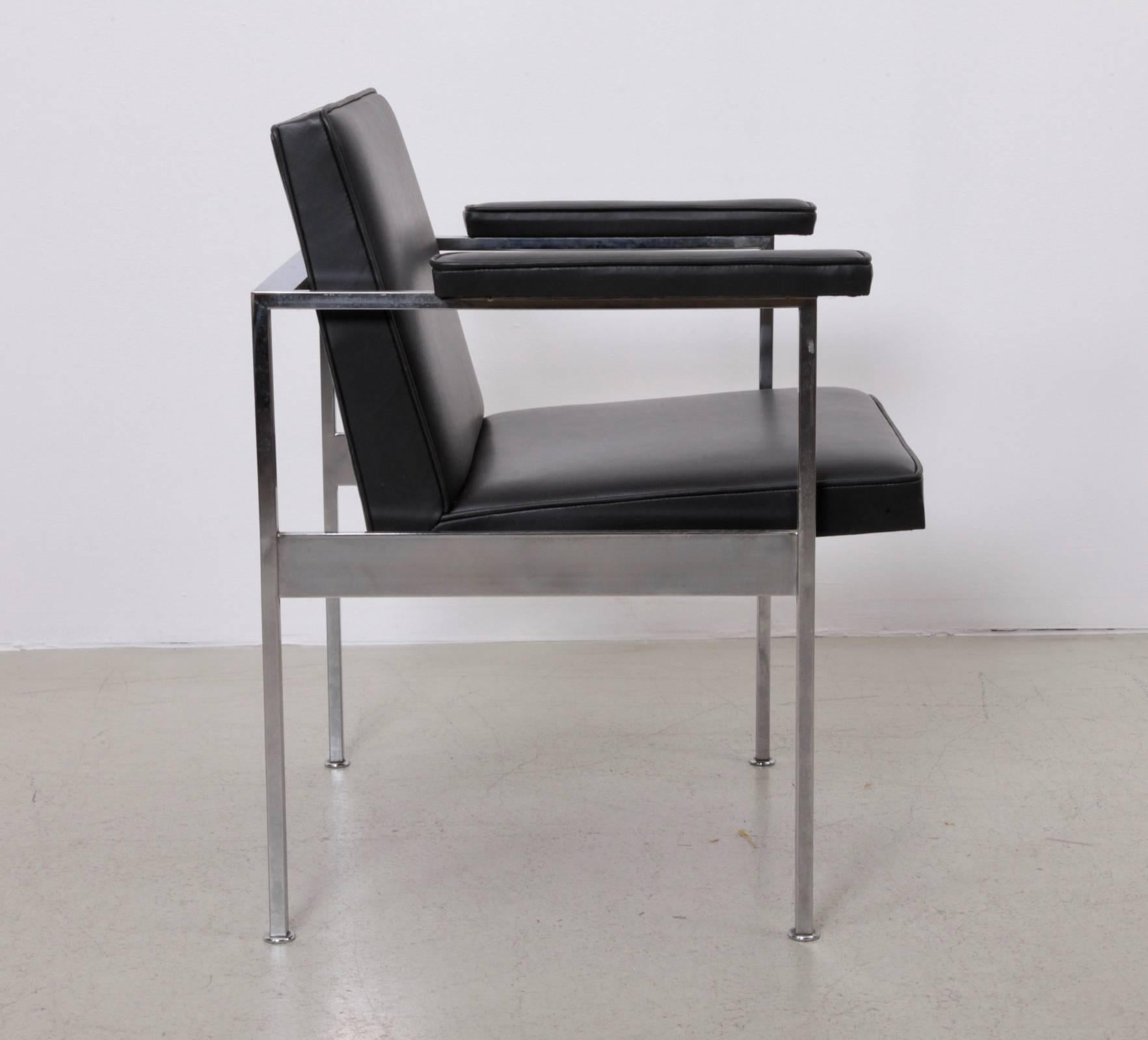 Set of four armchairs by George Nelson for Herman Miller in black aniline leather. Original Herman Miller circle tag present to underside as shown.

